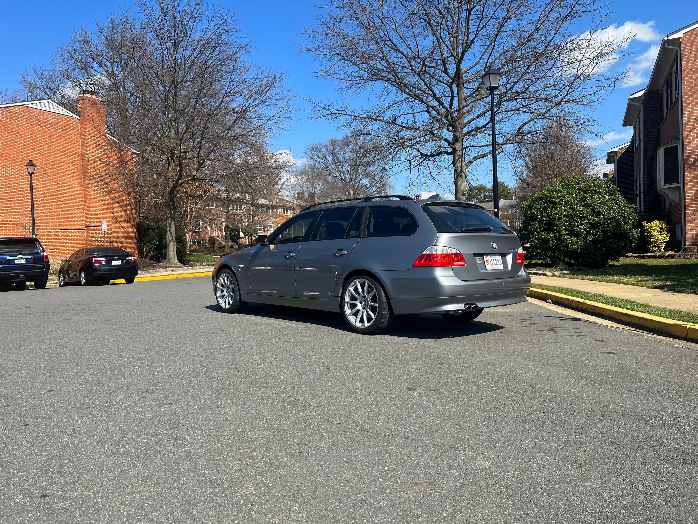 Grey BMW E61 Wagon 5 Series with 19" SM-10 Apex wheels in Race Silver