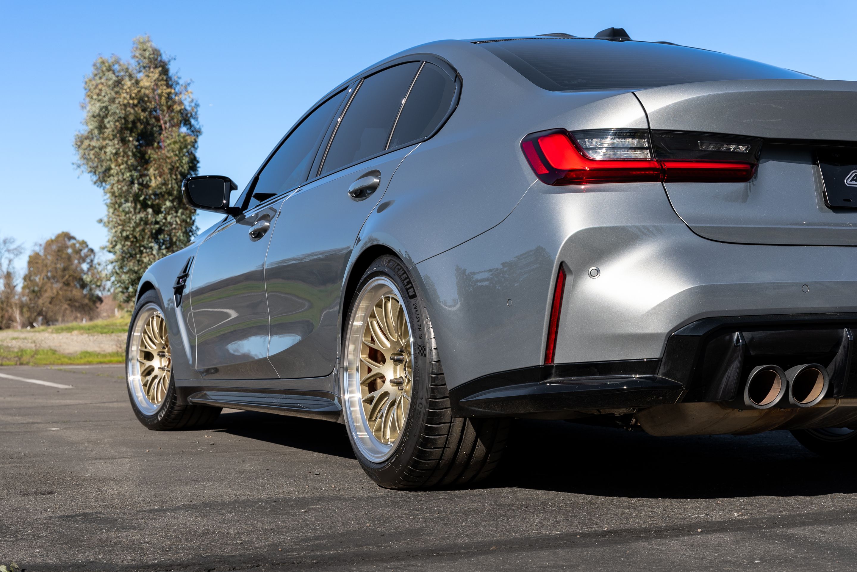 Grey BMW G80 M3 with 19" ML-10RT Apex wheels in Machined Lip Gloss Motorsport Gold