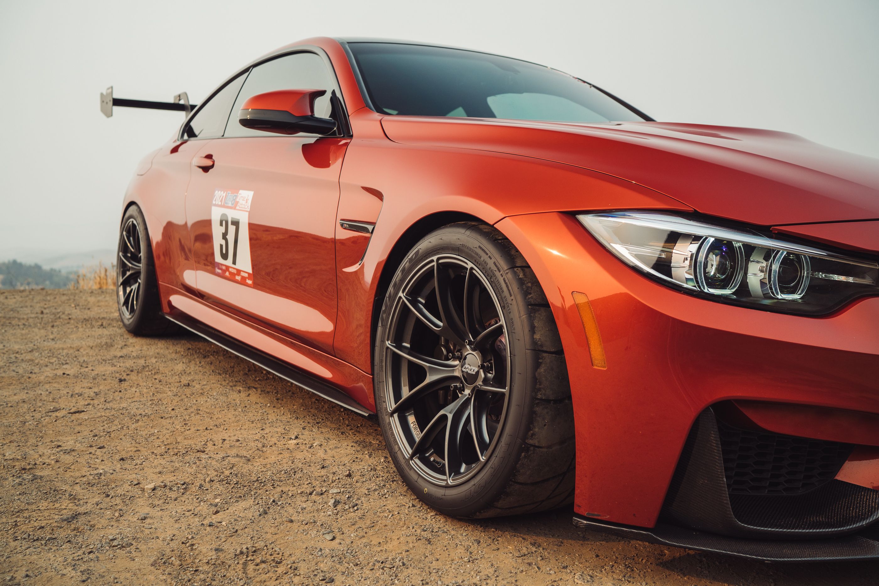 Orange BMW F82 Coupe M4 with 18" VS-5RS Apex wheels in Anthracite