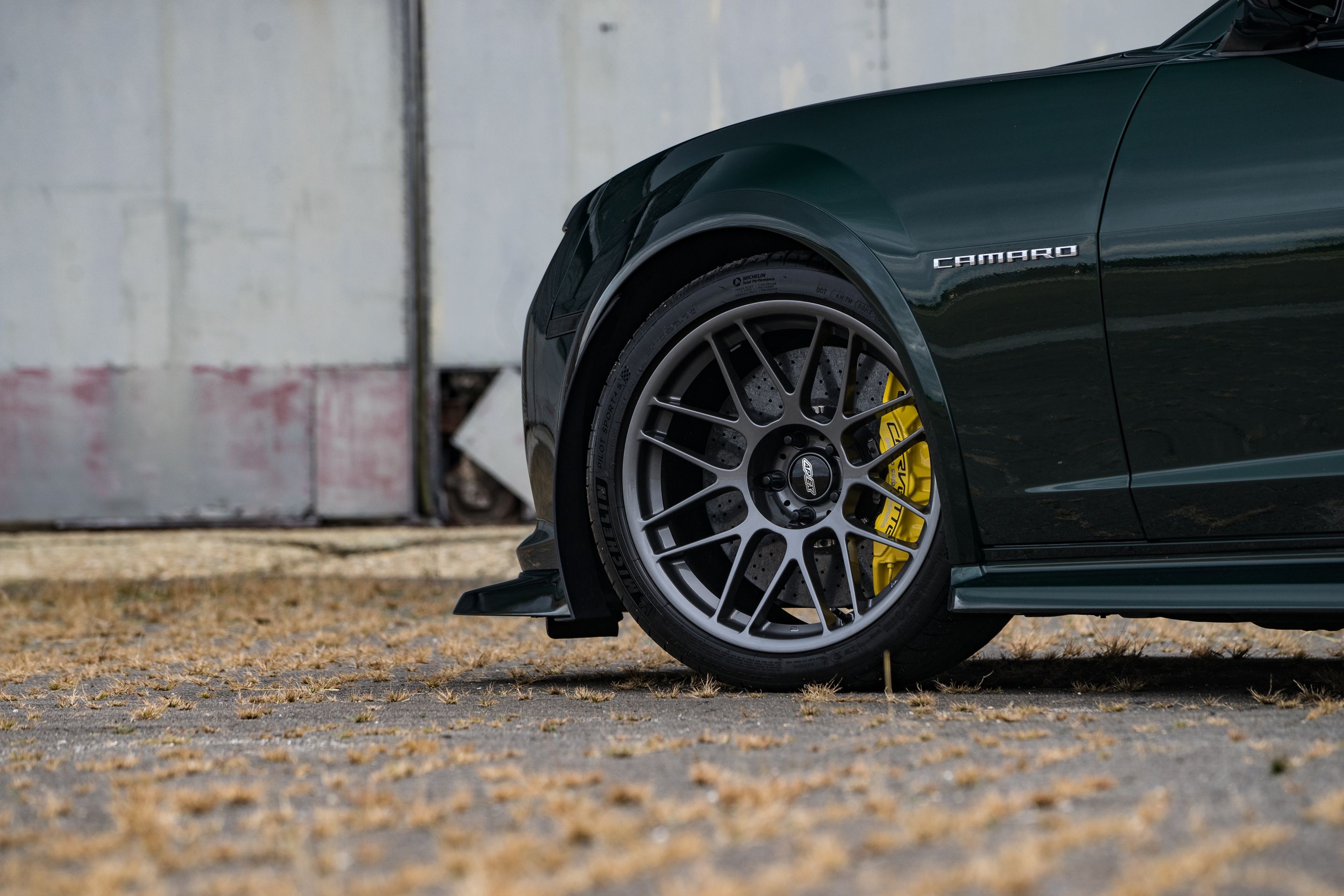 Green Chevrolet 5th Gen Camaro SS with 19" ARC-8 Apex wheels in Anthracite