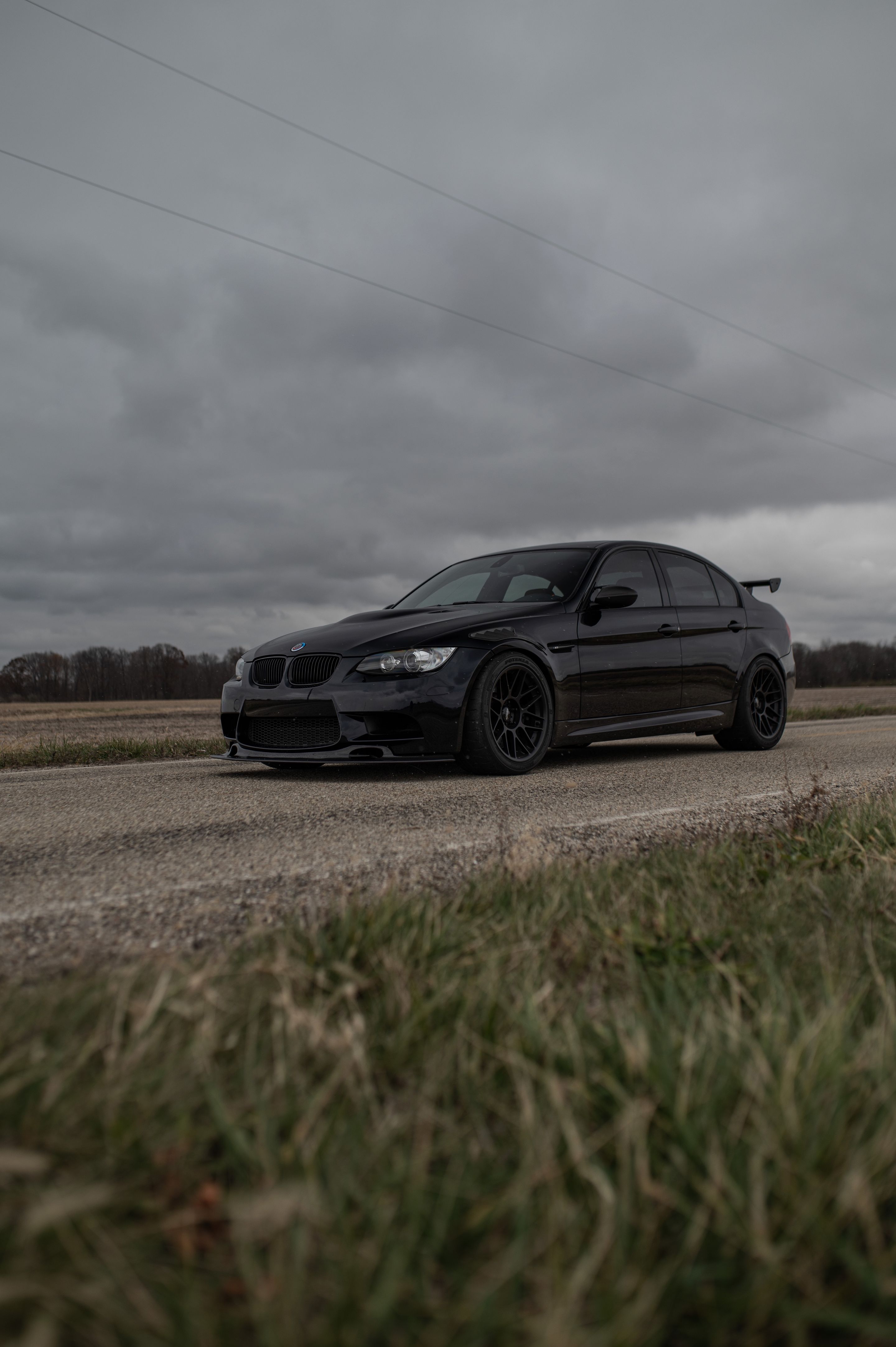 Black BMW E90 Sedan M3 with 18" ARC-8 Apex wheels in Satin Black