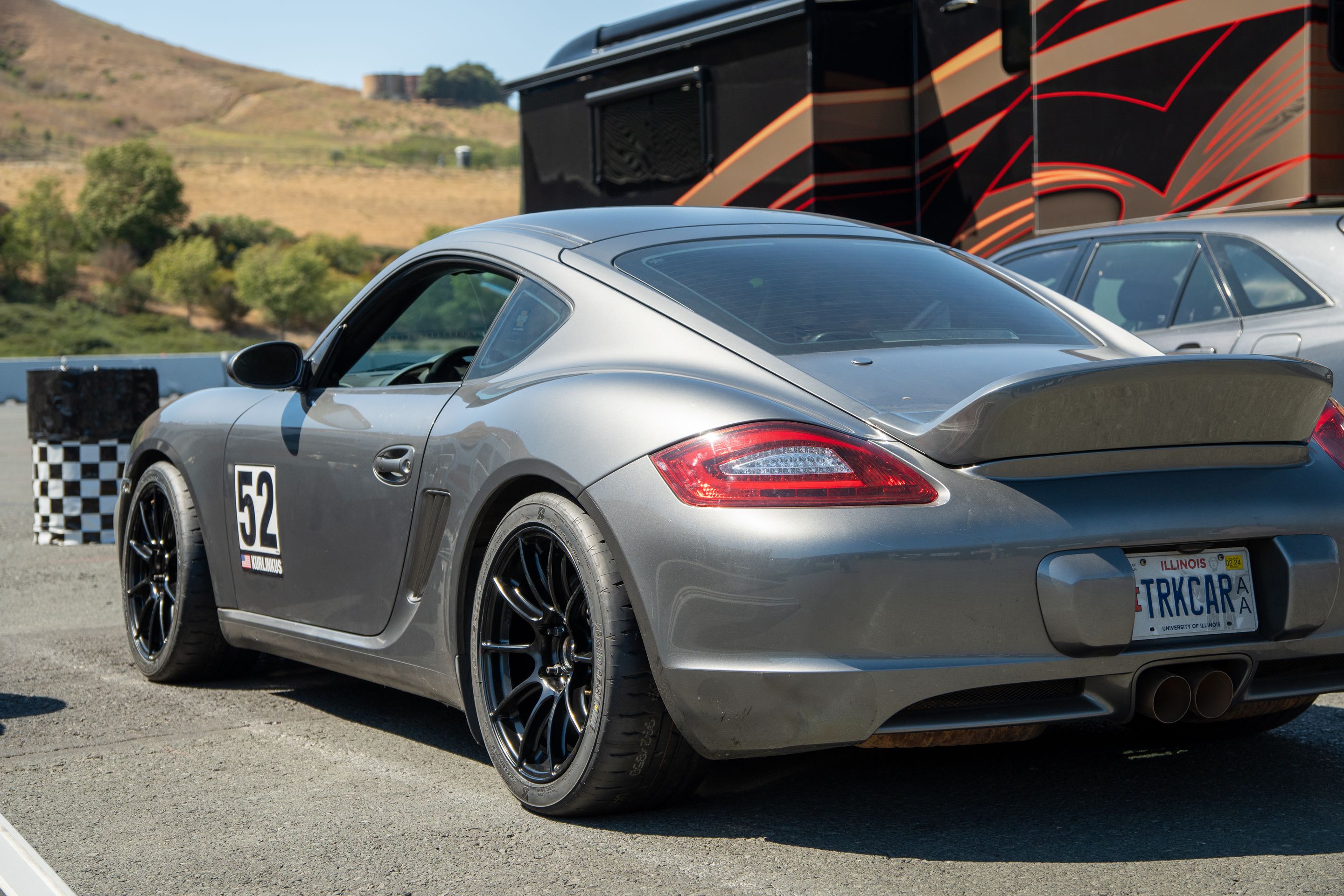 Grey Porsche 987 Cayman S with 18" SM-10RS Apex wheels in Satin Black