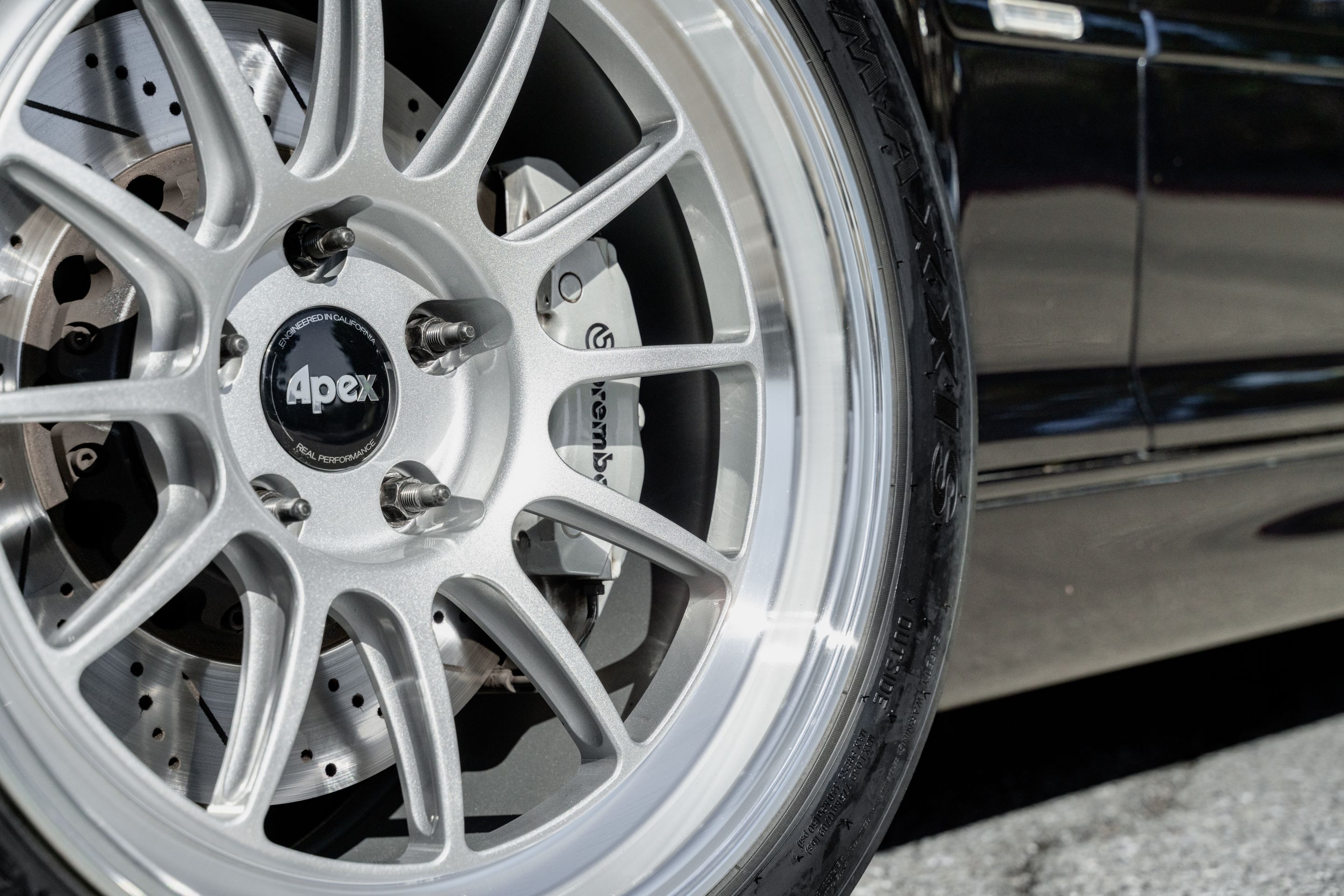 Black BMW E46 M3 with 18" SL-12 Apex wheels in Machined Lip Race Silver