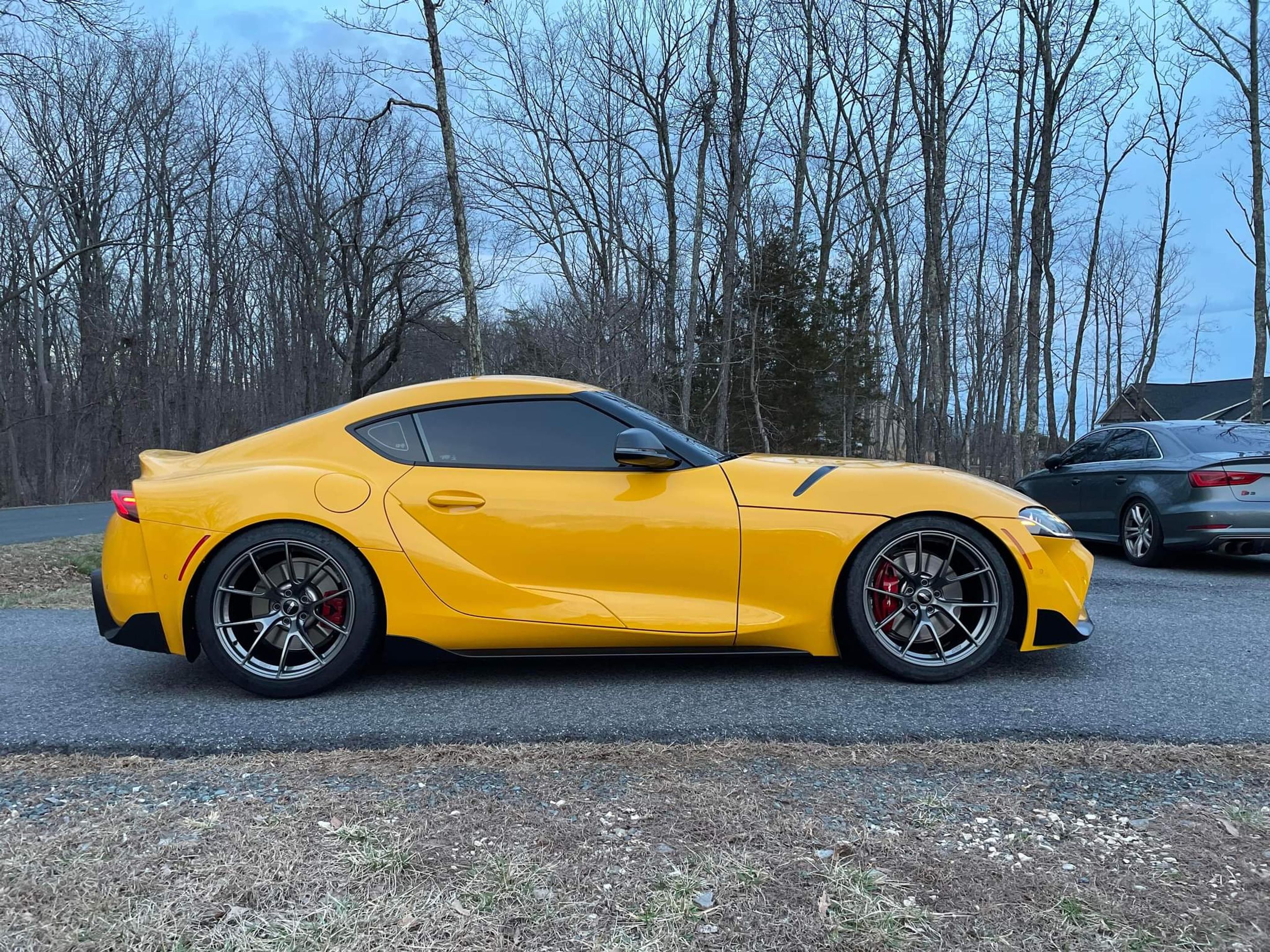 Yellow Toyota GR Supra with 19" VS-5RS Apex wheels in Anthracite