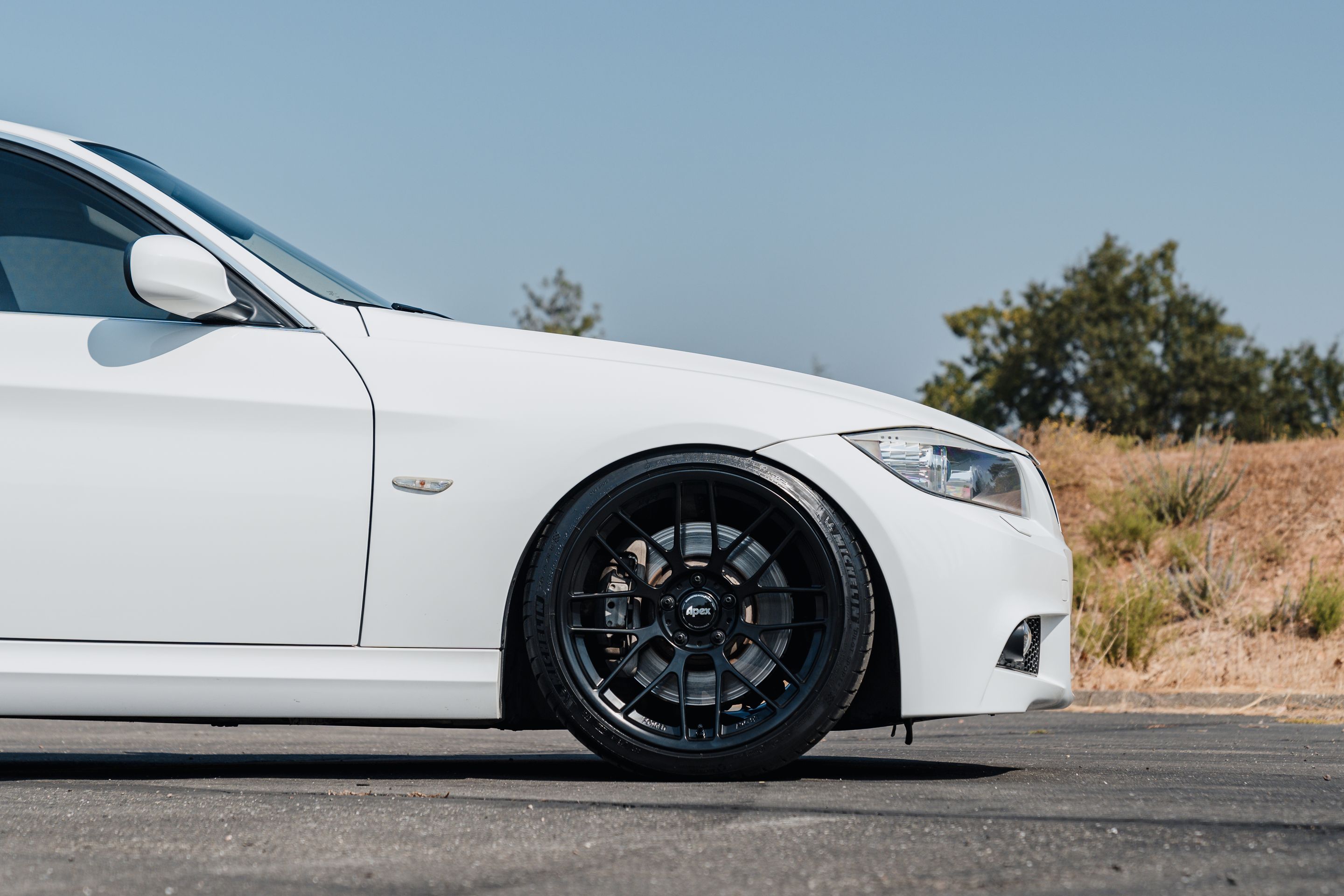 White BMW E90 LCI Sedan 3 Series with 19" ARC-8RT Apex wheels in Satin Black