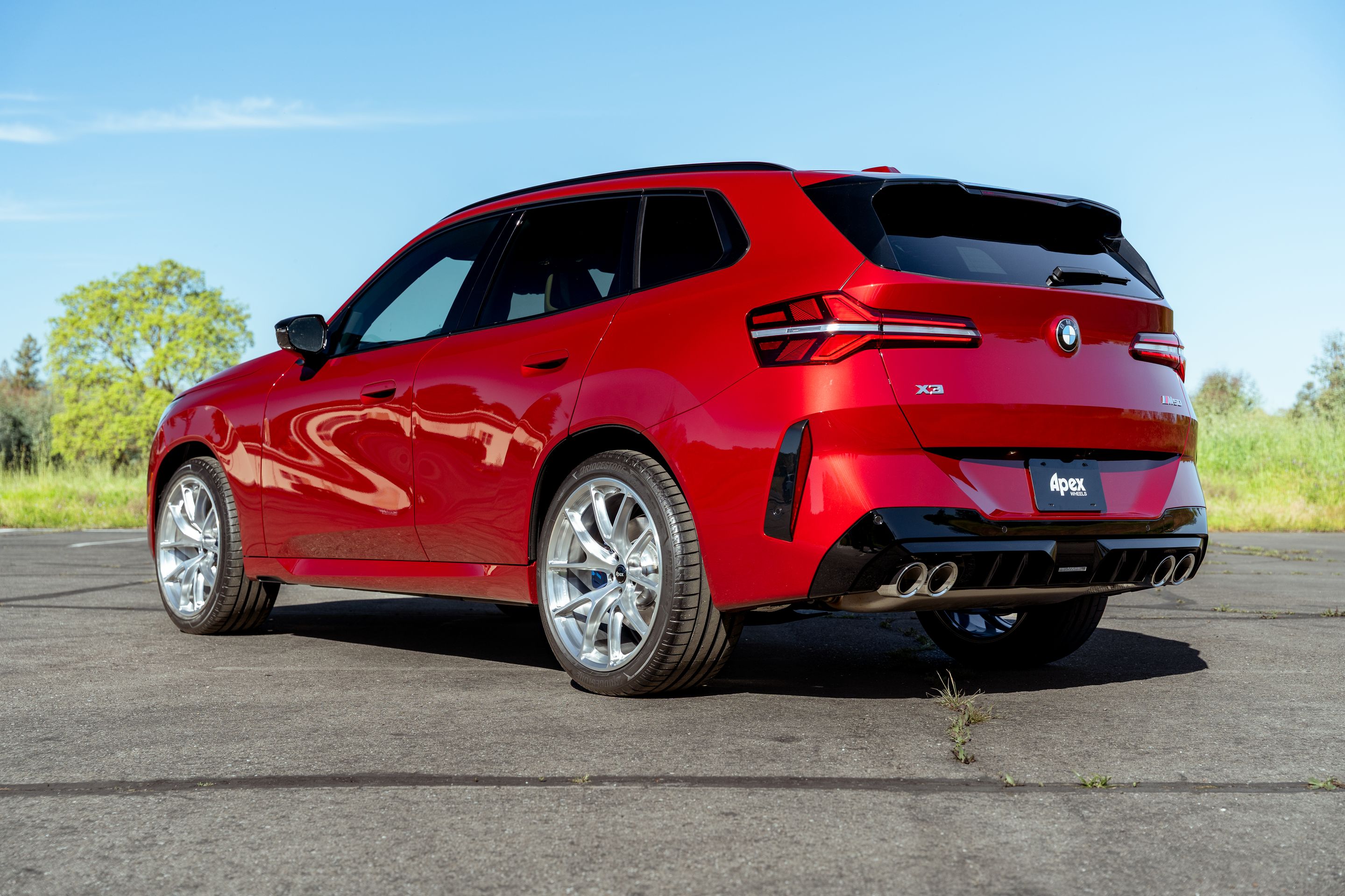 Red BMW G45 X3 with 21" VS-5RX Apex wheels in Brushed Clear