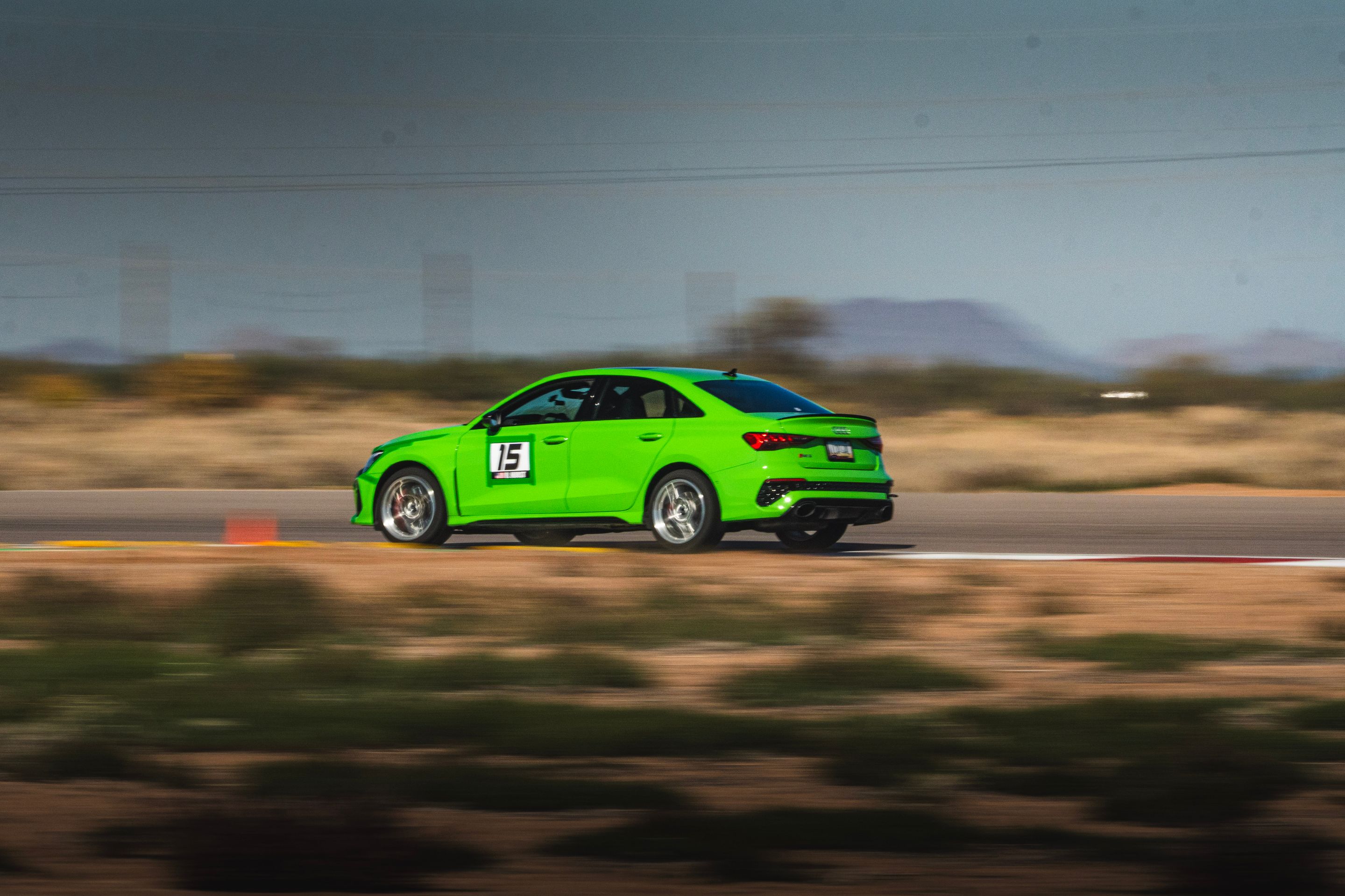 Green Audi 8Y RS 3 with 18" VS-5RS Apex wheels in Brushed Clear