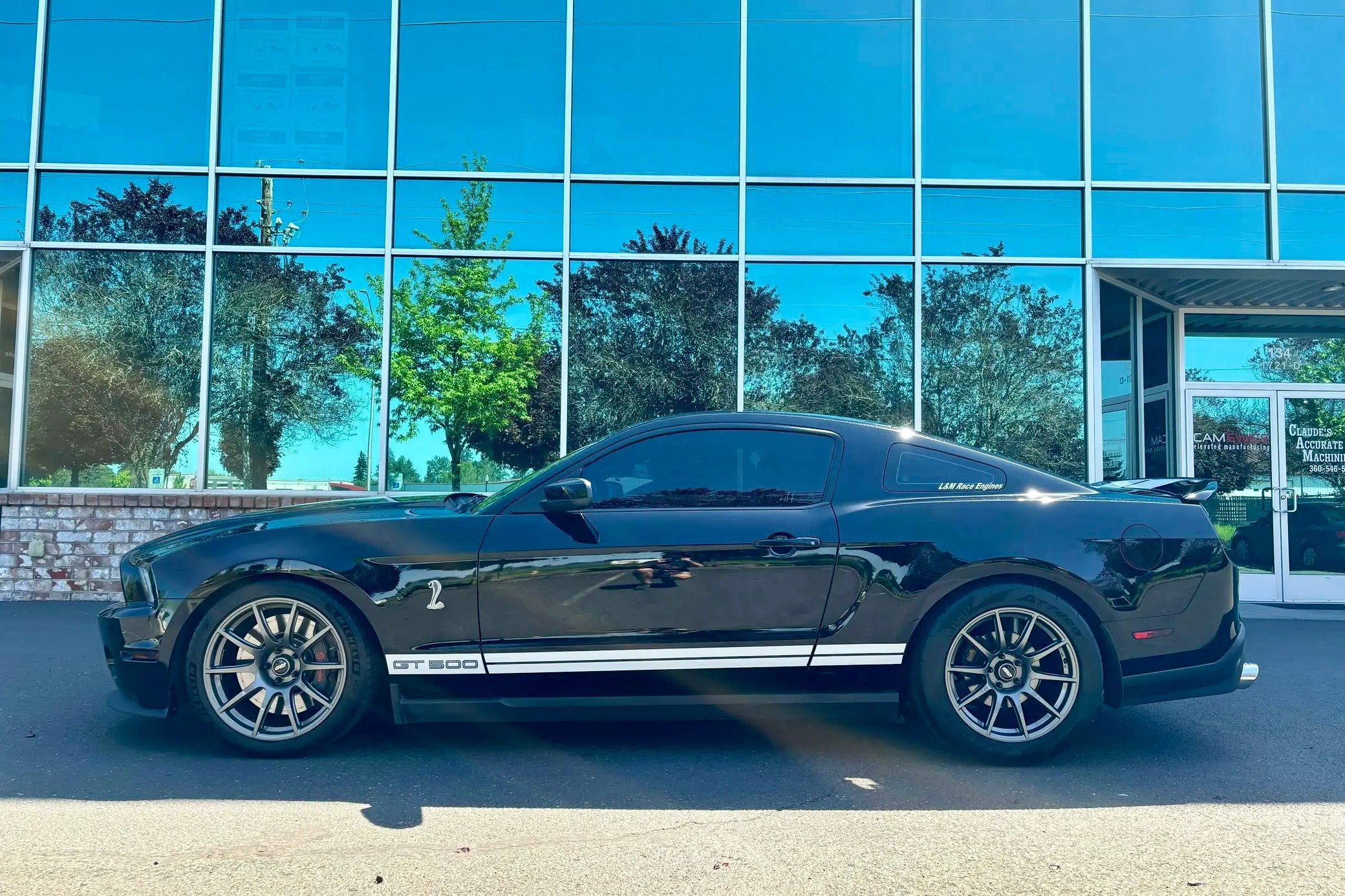 Black Ford S197 Mustang GT500 with 19"/18" SM-10 Apex wheels in Anthracite