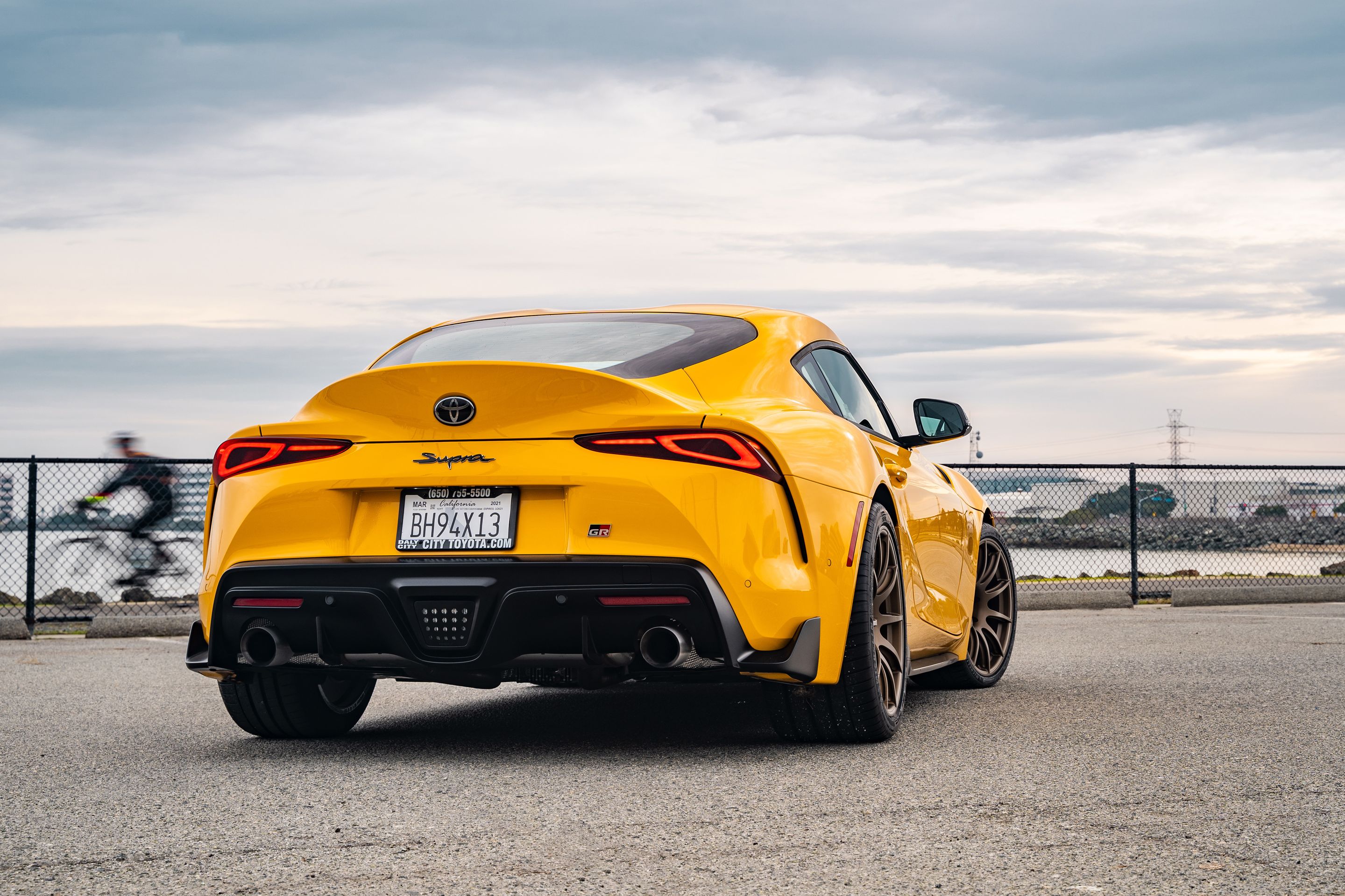 Yellow Toyota GR Supra with 19" SM-10 Apex wheels in Satin Bronze