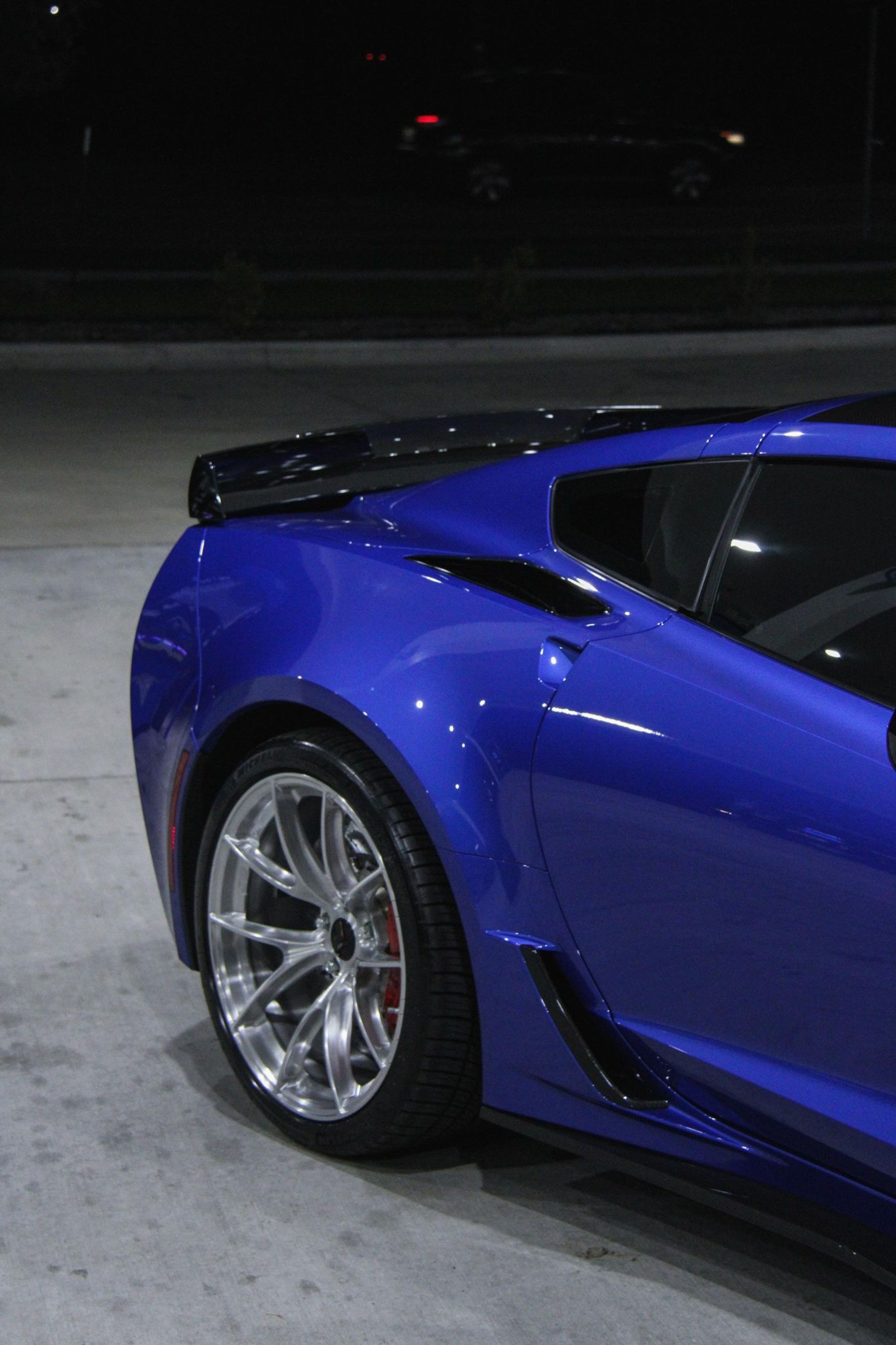 Blue Chevrolet C7 Corvette Z06 with 19"/20" VS-5RS Apex wheels in Brushed Clear