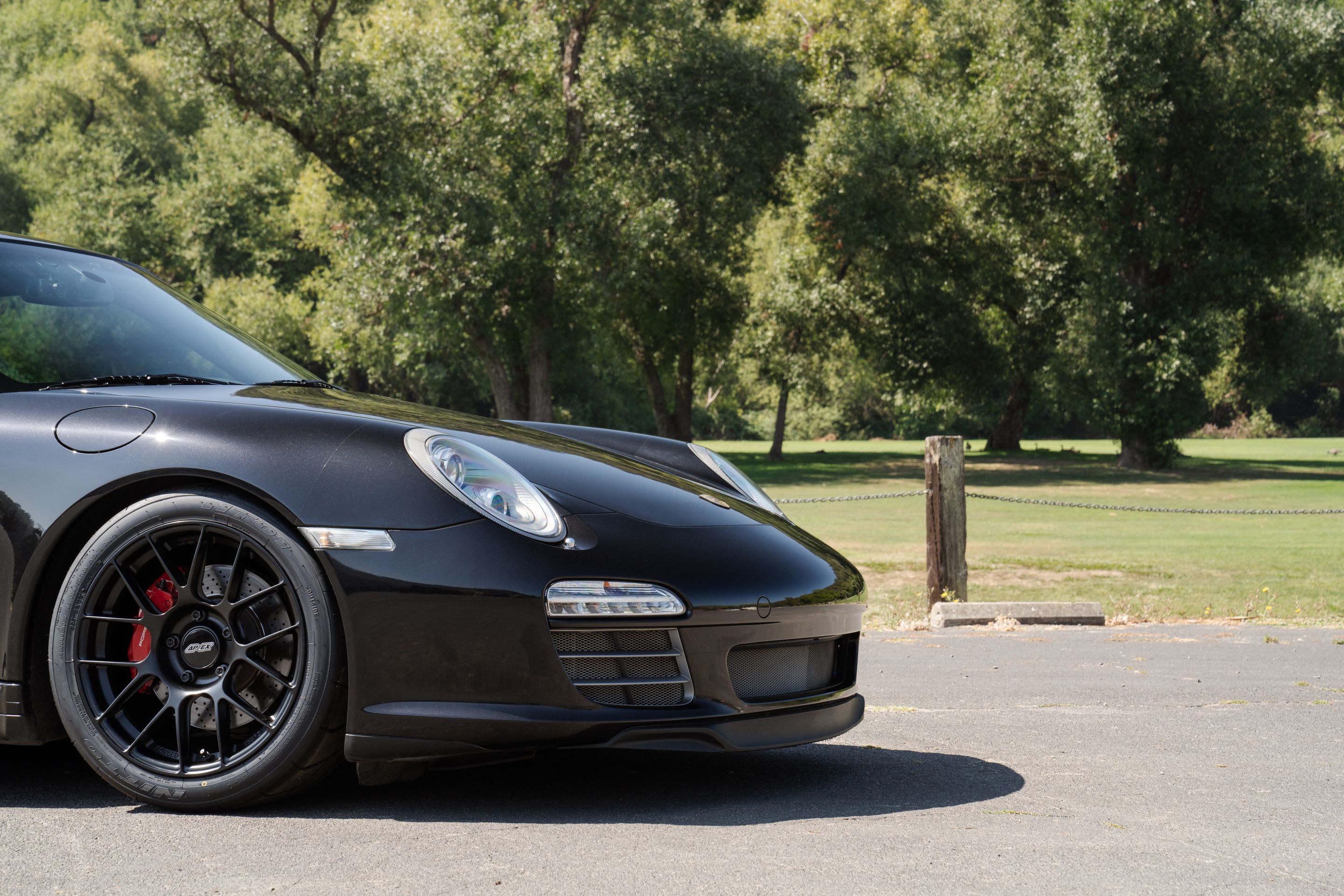 Black Porsche 911 997 Carrera 4S with 18" EC-7RS Apex wheels in Satin Black