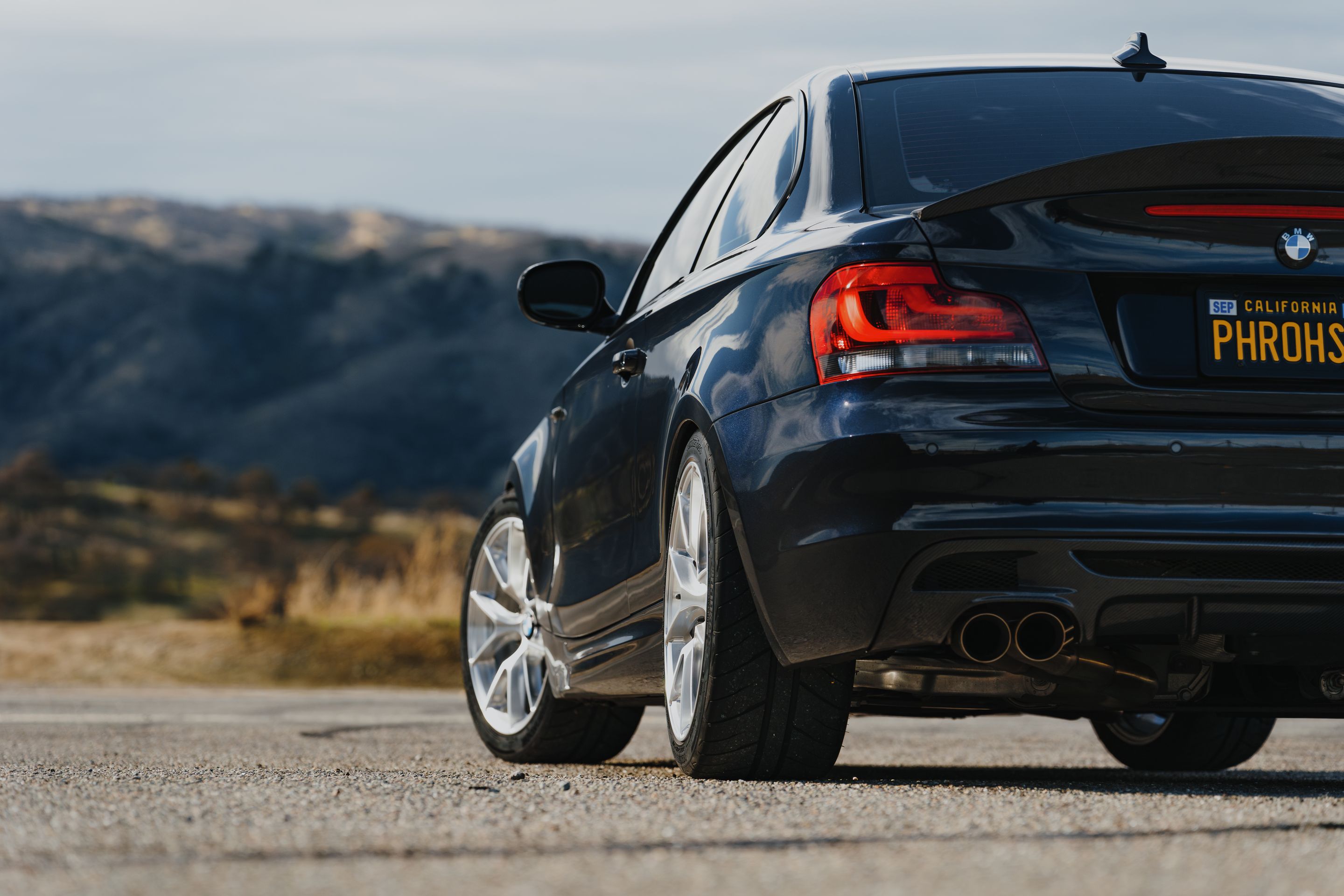 Black BMW E82 Coupe 1 Series with 18" VS-5RS Apex wheels in Brushed Clear