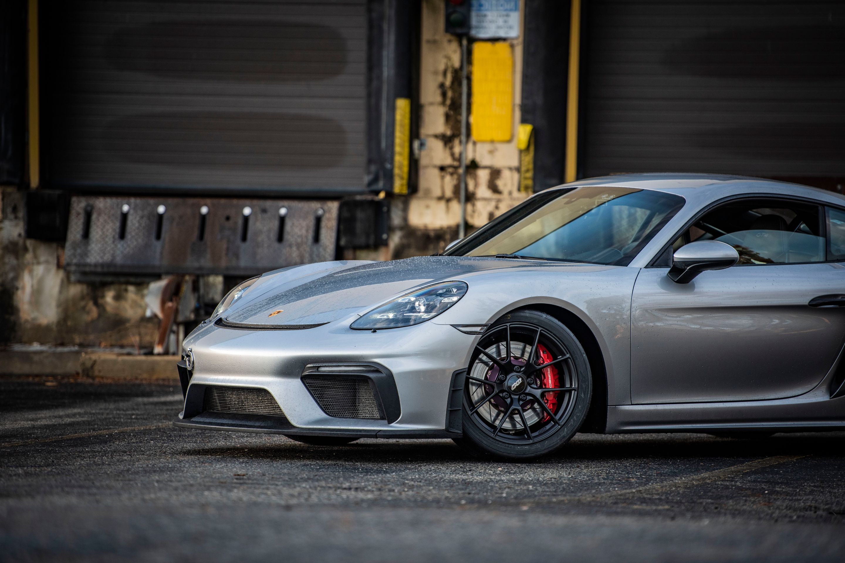 Silver Porsche 718 Cayman GT4 with 19" VS-5RS Apex wheels in Satin Black