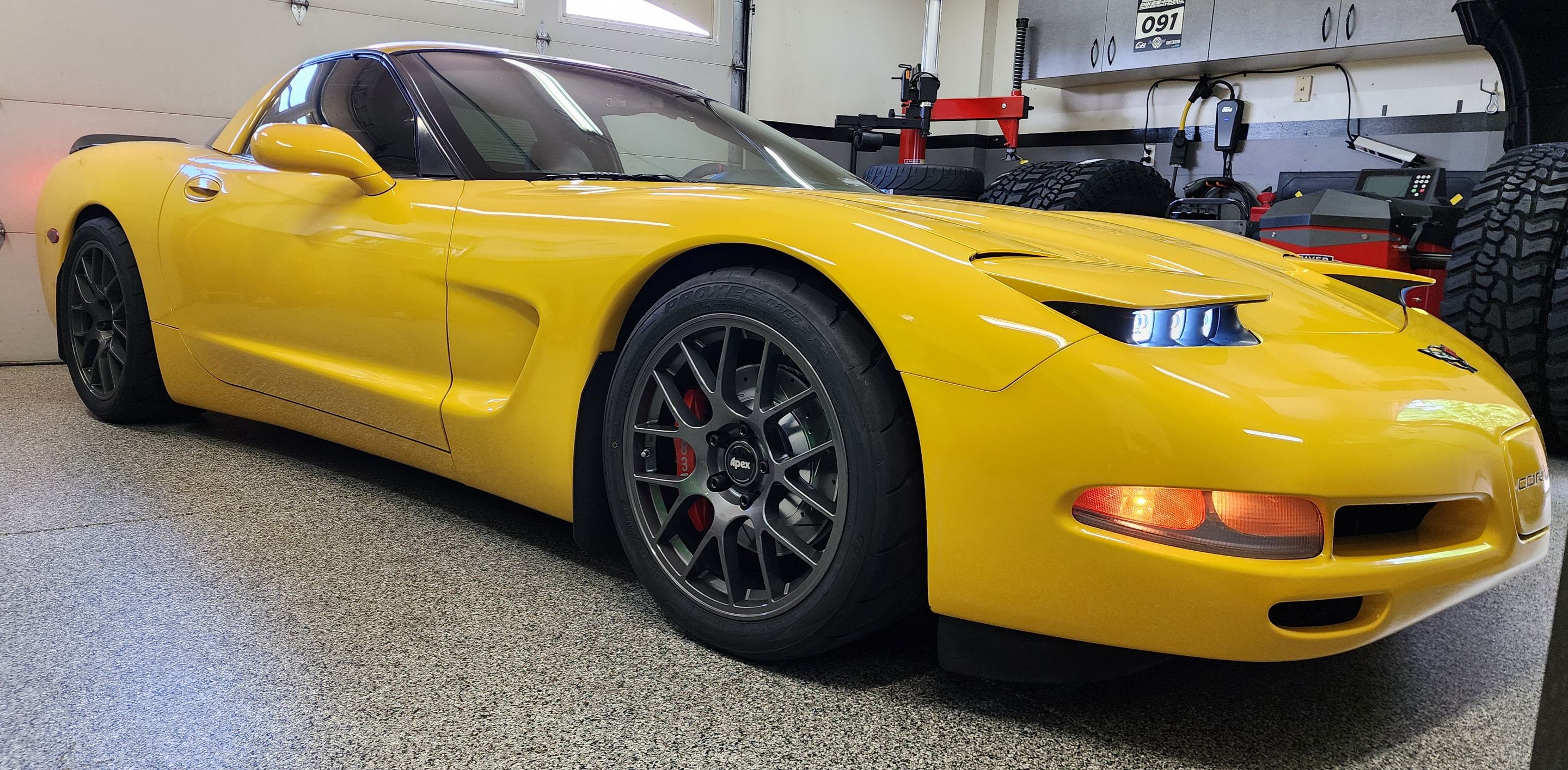 Yellow Chevrolet C5 Corvette Base/Z51 with 18" EC-7 Apex wheels in Anthracite