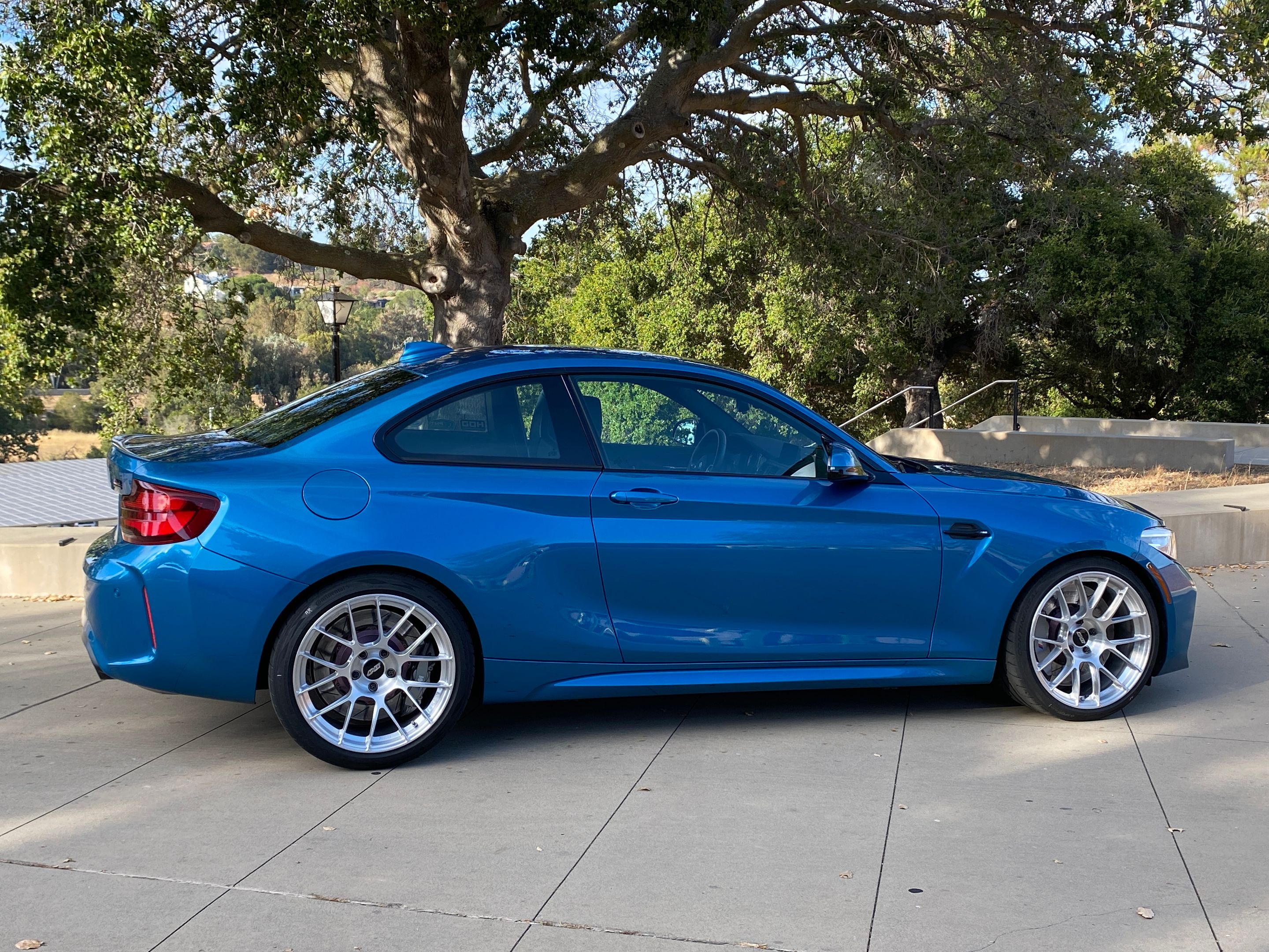 Blue BMW F87 M2 with 19" EC-7RS Apex wheels in Brushed Clear