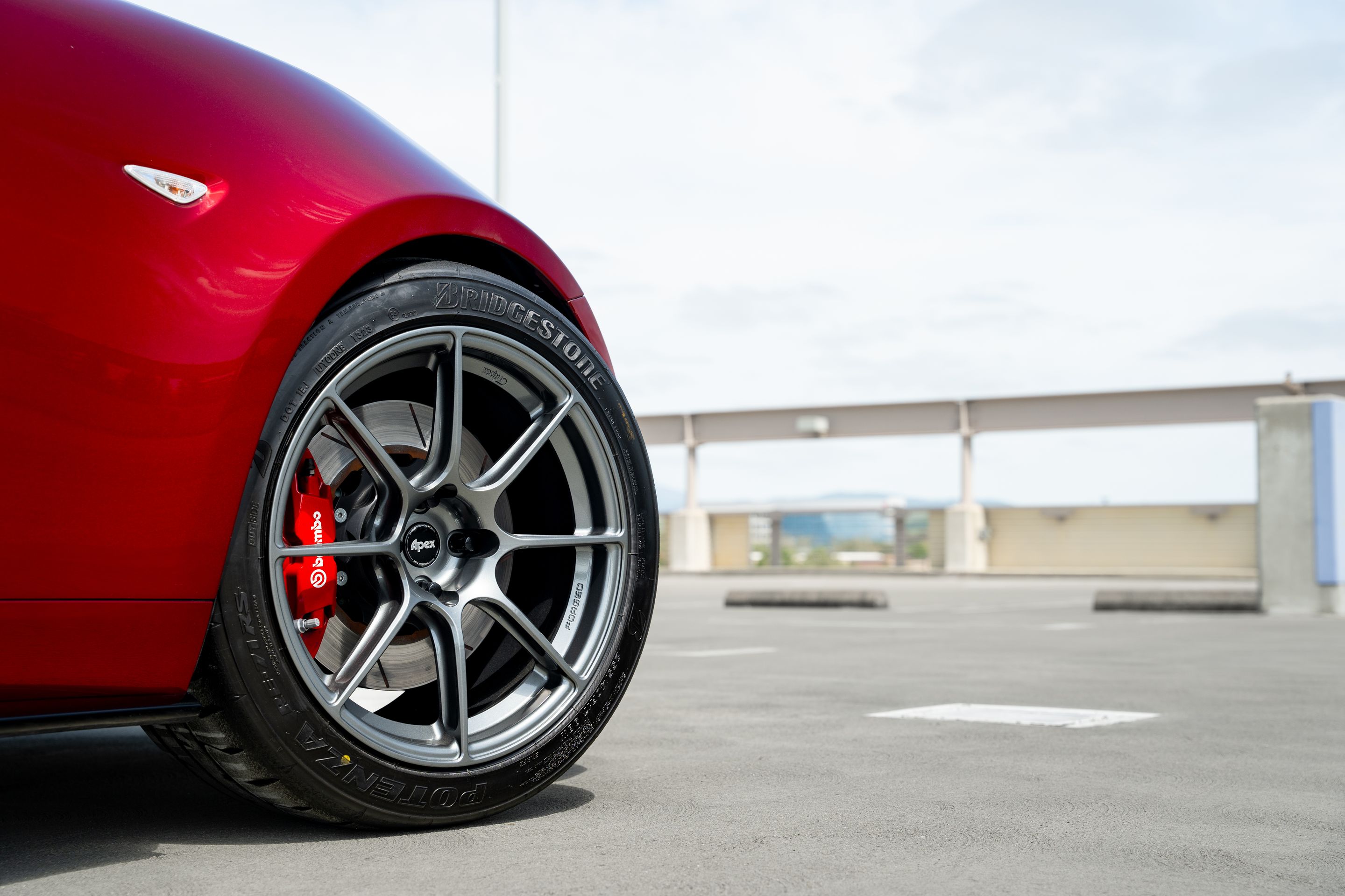Red Mazda ND MX-5 Miata with 17" SM-8RS Apex wheels in Anthracite