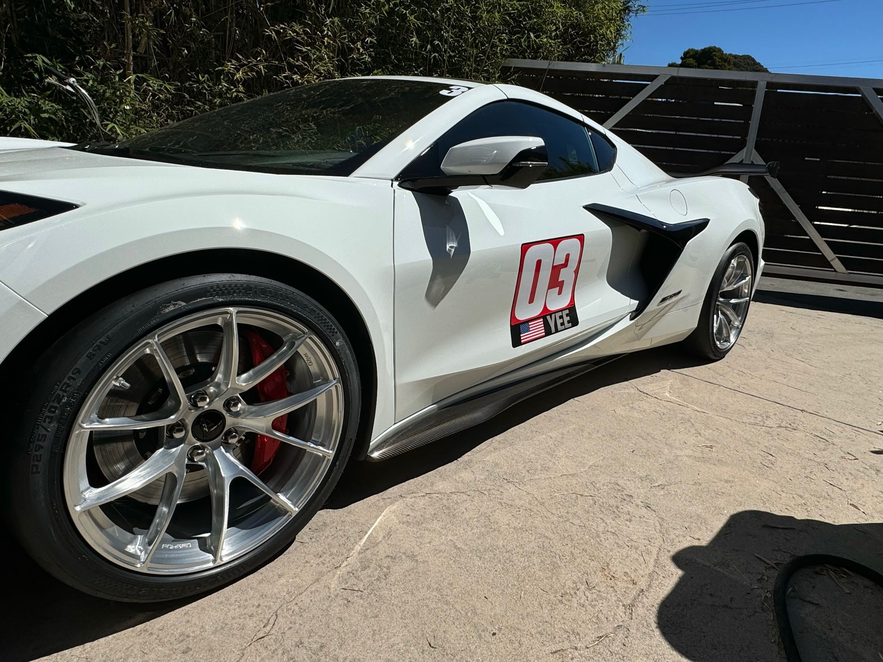 White Chevrolet C8 Corvette Z06 with 19" VS-5RS Apex wheels in Brushed Clear