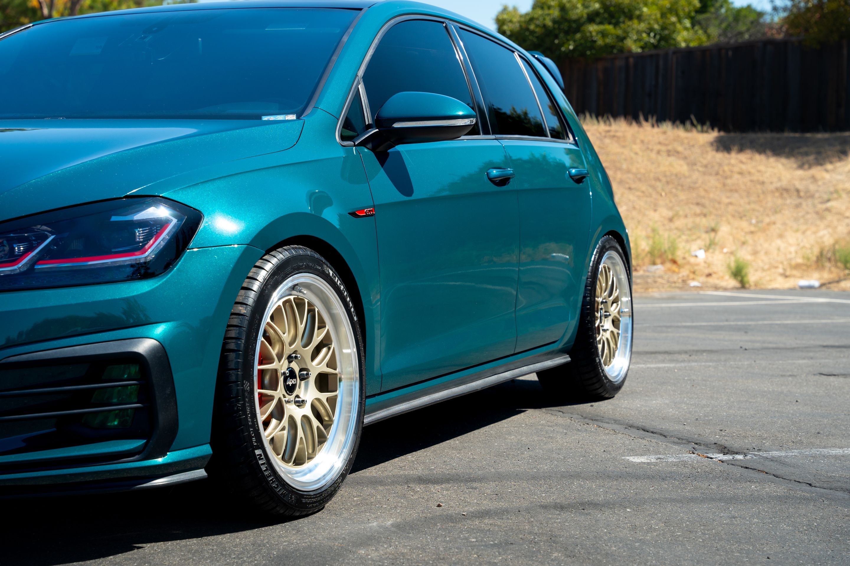 Green VW MK7 GTI with 18" ML-10RT Apex wheels in Machined Lip Gloss Motorsport Gold