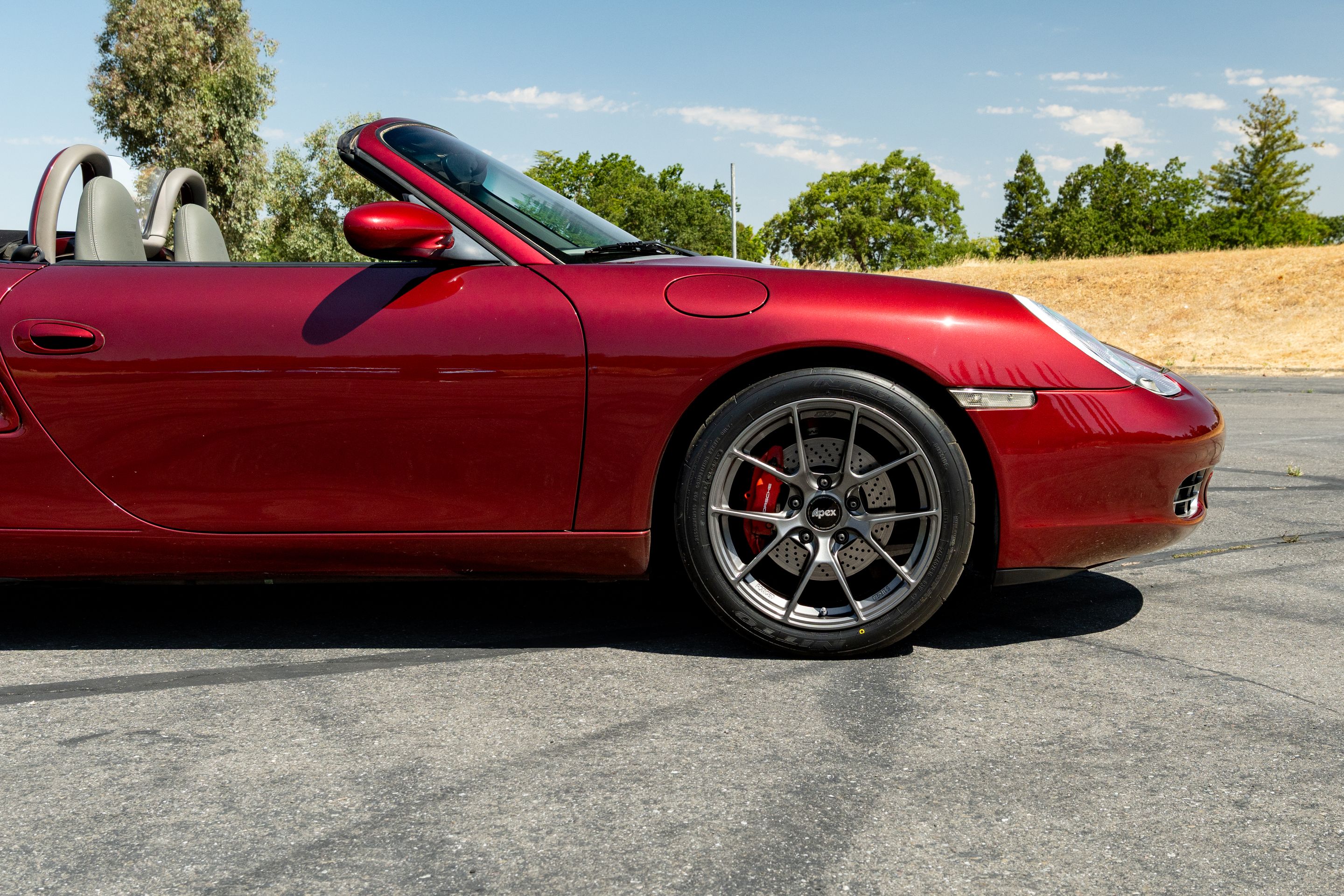 Red Porsche 986 Boxster with 18" VS-5RS Apex wheels in Anthracite