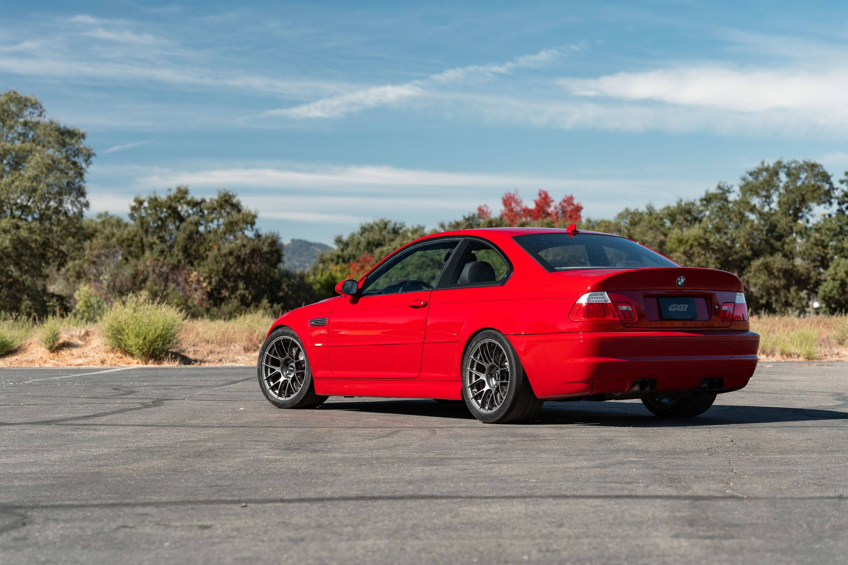 Red BMW E46 M3 with 18" EC-7RS Apex wheels in Anthracite