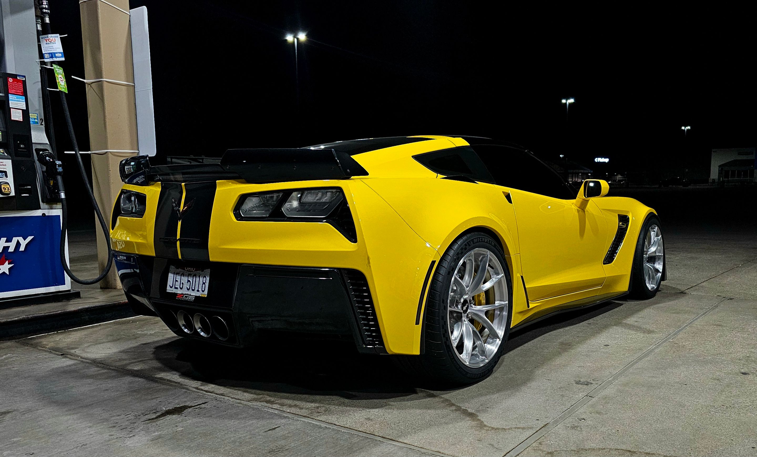 Yellow Chevrolet C7 Corvette Z06 with 19"/20" VS-5RS Apex wheels in Brushed Clear