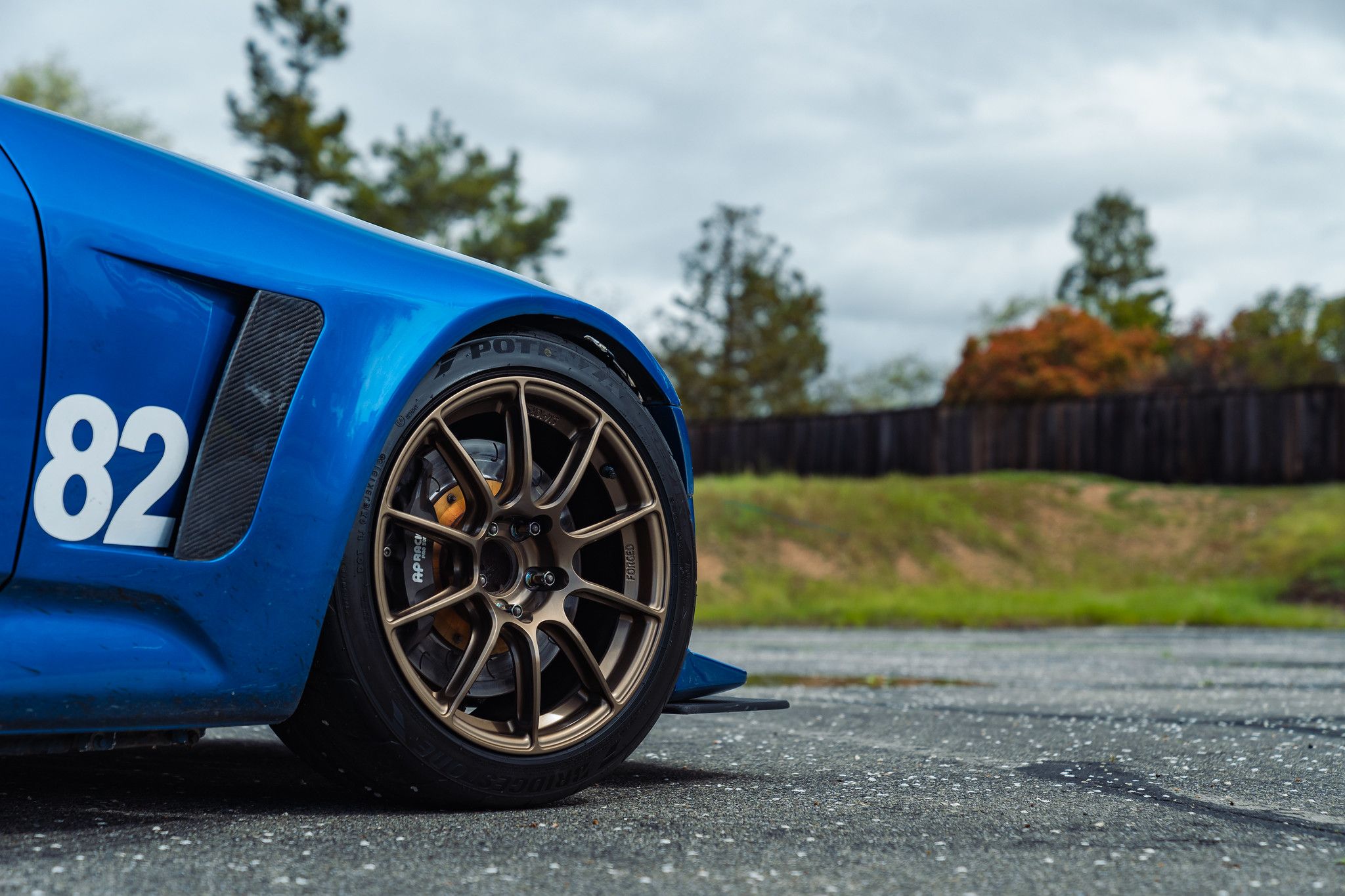 Blue Honda S2000 with 17" SM-10RS Apex wheels in Satin Bronze