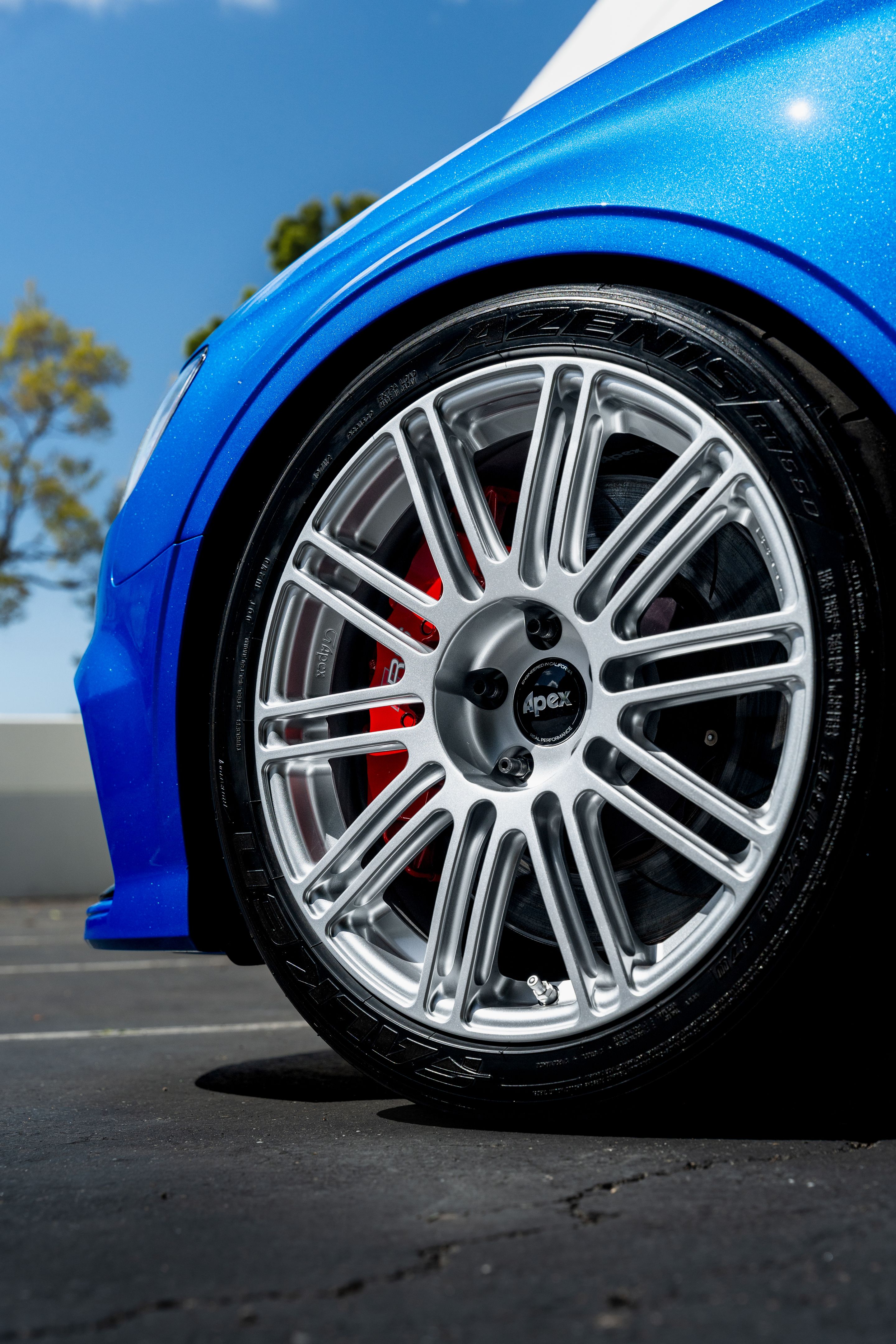 Blue Audi 8V RS 3 with 18" TC-10RT Apex wheels in Race Silver