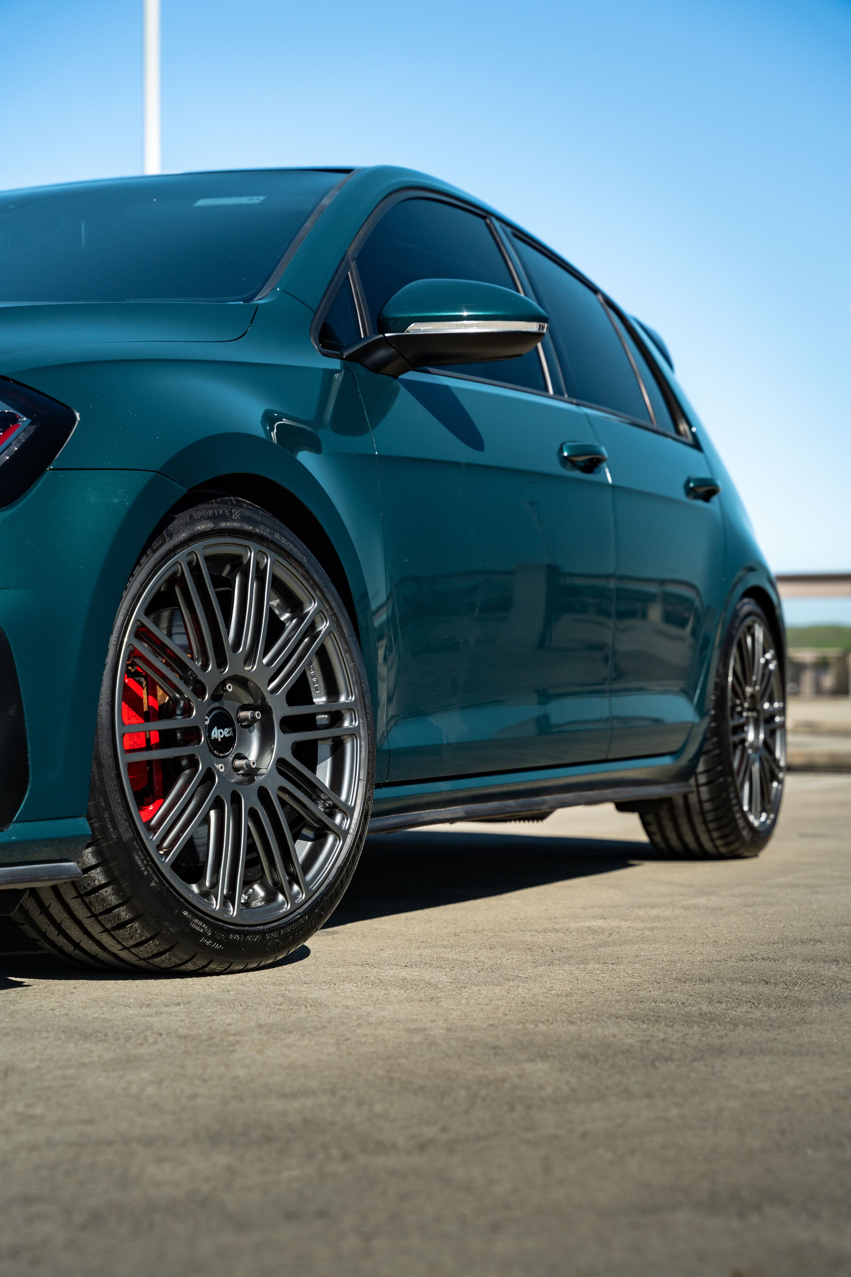 Green VW MK7 GTI with 18" TC-10RT Apex wheels in Anthracite