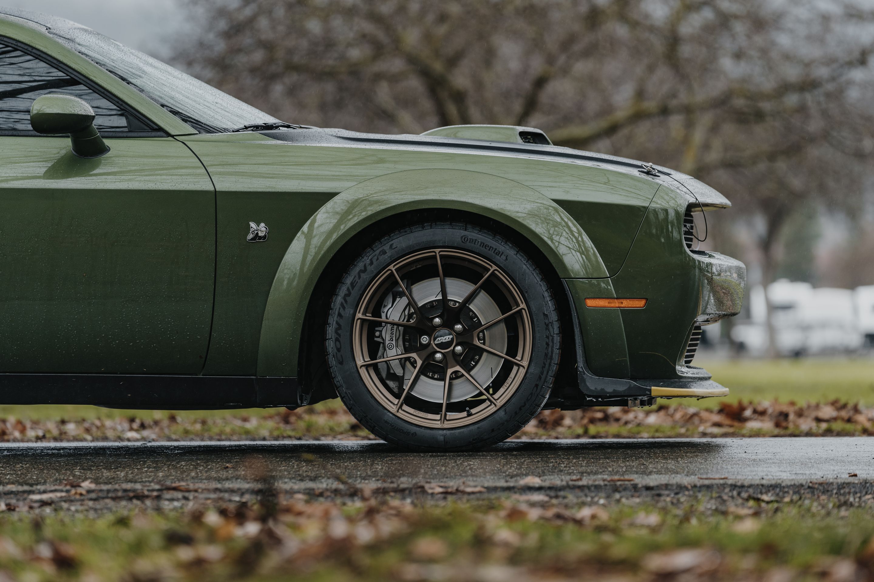 Green Dodge Challenger R/T Scat Pack Widebody with 20" VS-5RS Apex wheels in Satin Bronze