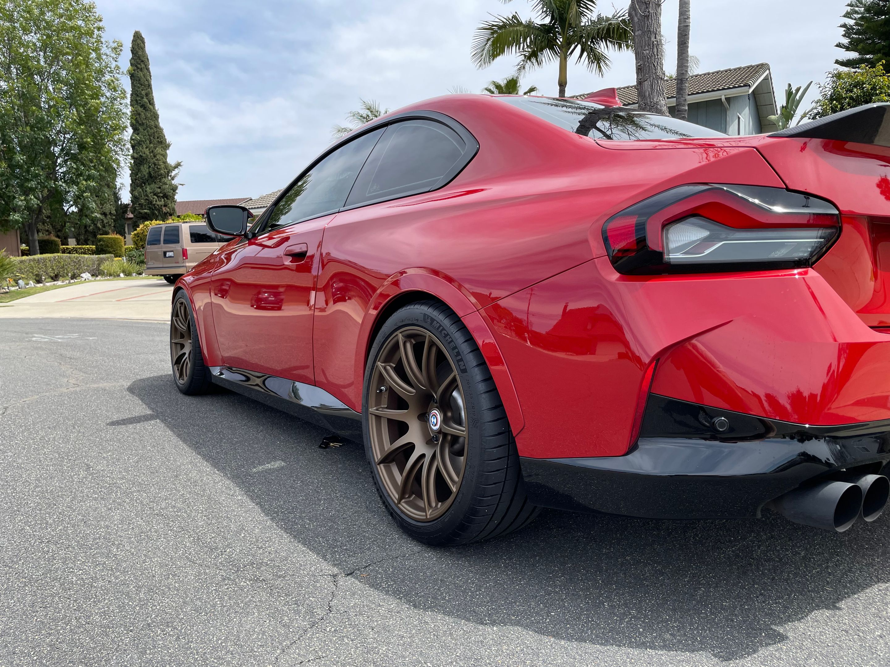 Red BMW G42 2 Series with 19" SM-10 Apex wheels in Satin Bronze
