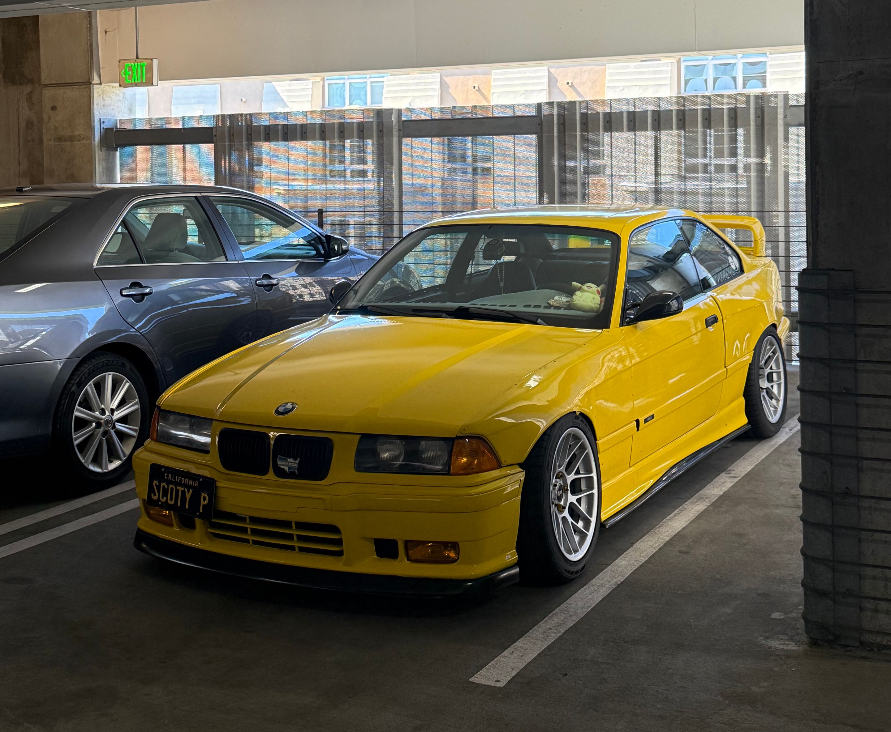 Yellow BMW E36 M3 with 17" ARC-8 Apex wheels in Race Silver