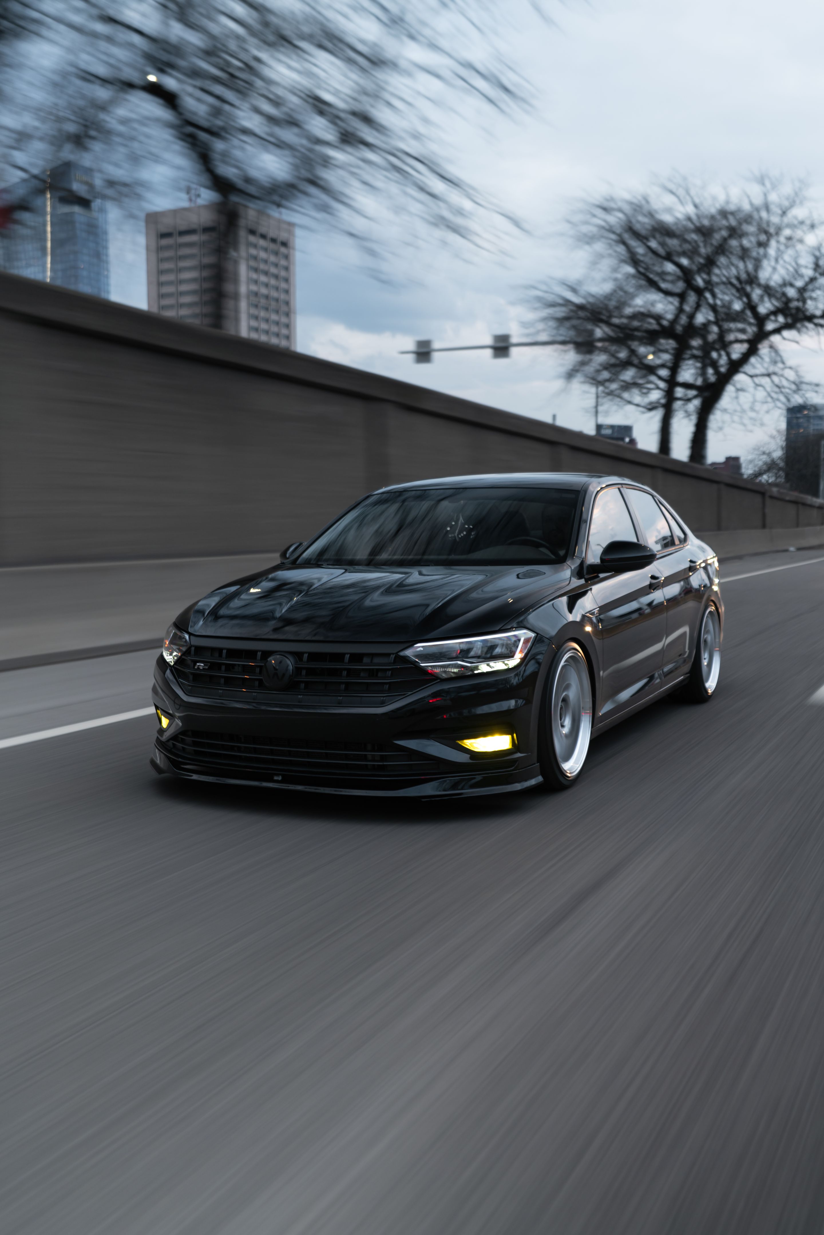 Black VW MK7 Jetta with 19" ML-10RT Apex wheels in Machined Lip Race Silver
