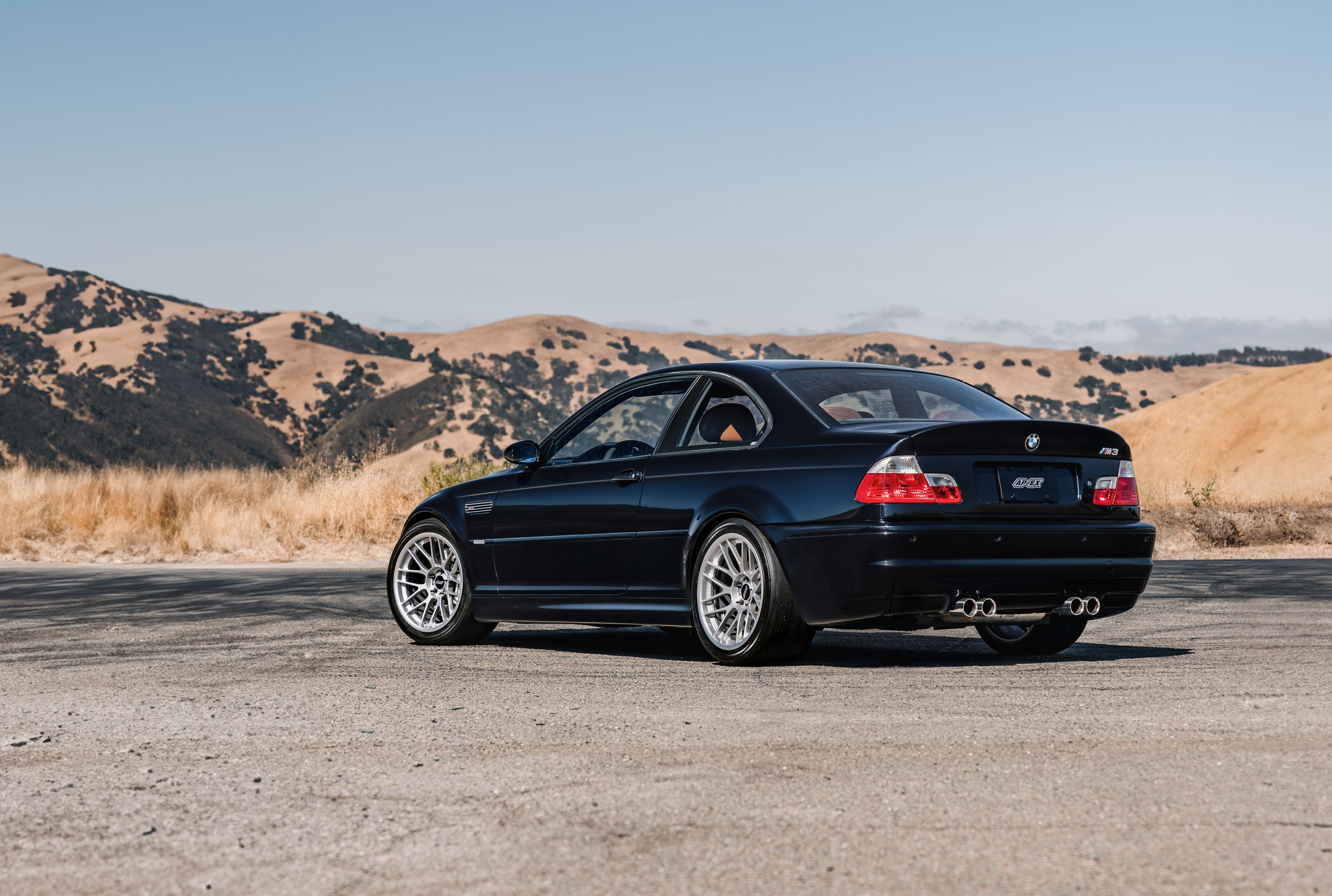 Black BMW E46 M3 with 18" ARC-8RT Apex wheels in Race Silver