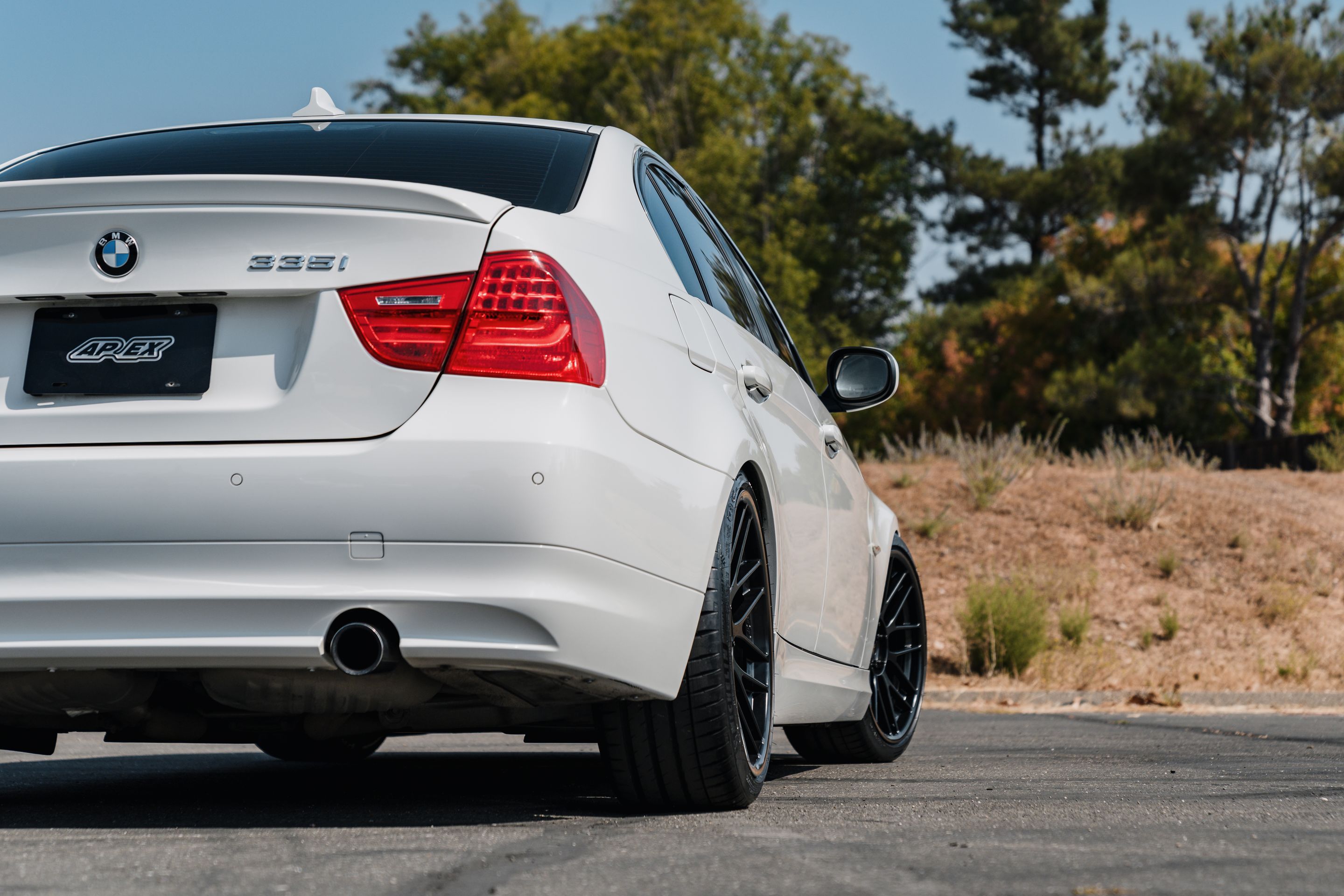 White BMW E90 LCI Sedan 3 Series with 19" ARC-8RT Apex wheels in Satin Black