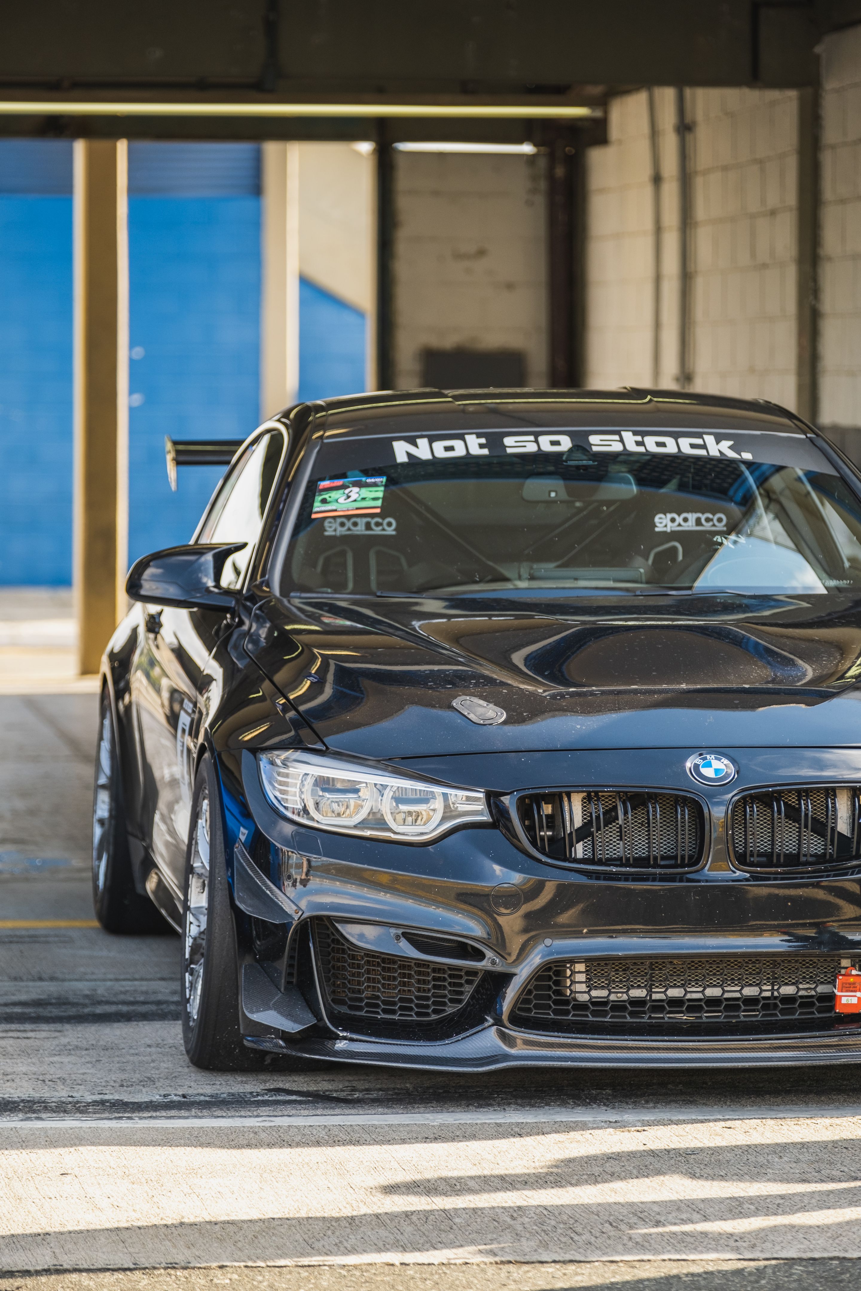 Black BMW F82 Coupe M4 with 18" EC-7 Apex wheels in Race Silver