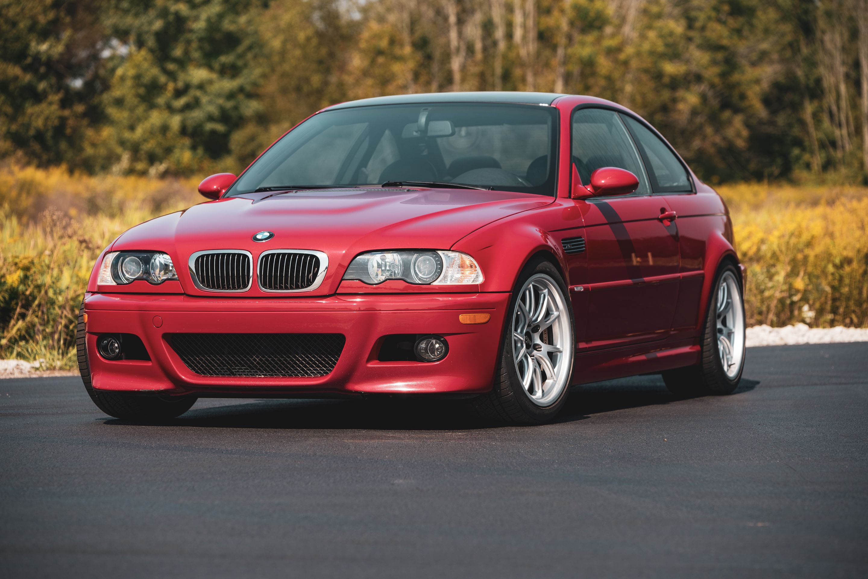 Red BMW E46 M3 with 18" FL-5 Apex wheels in Race Silver