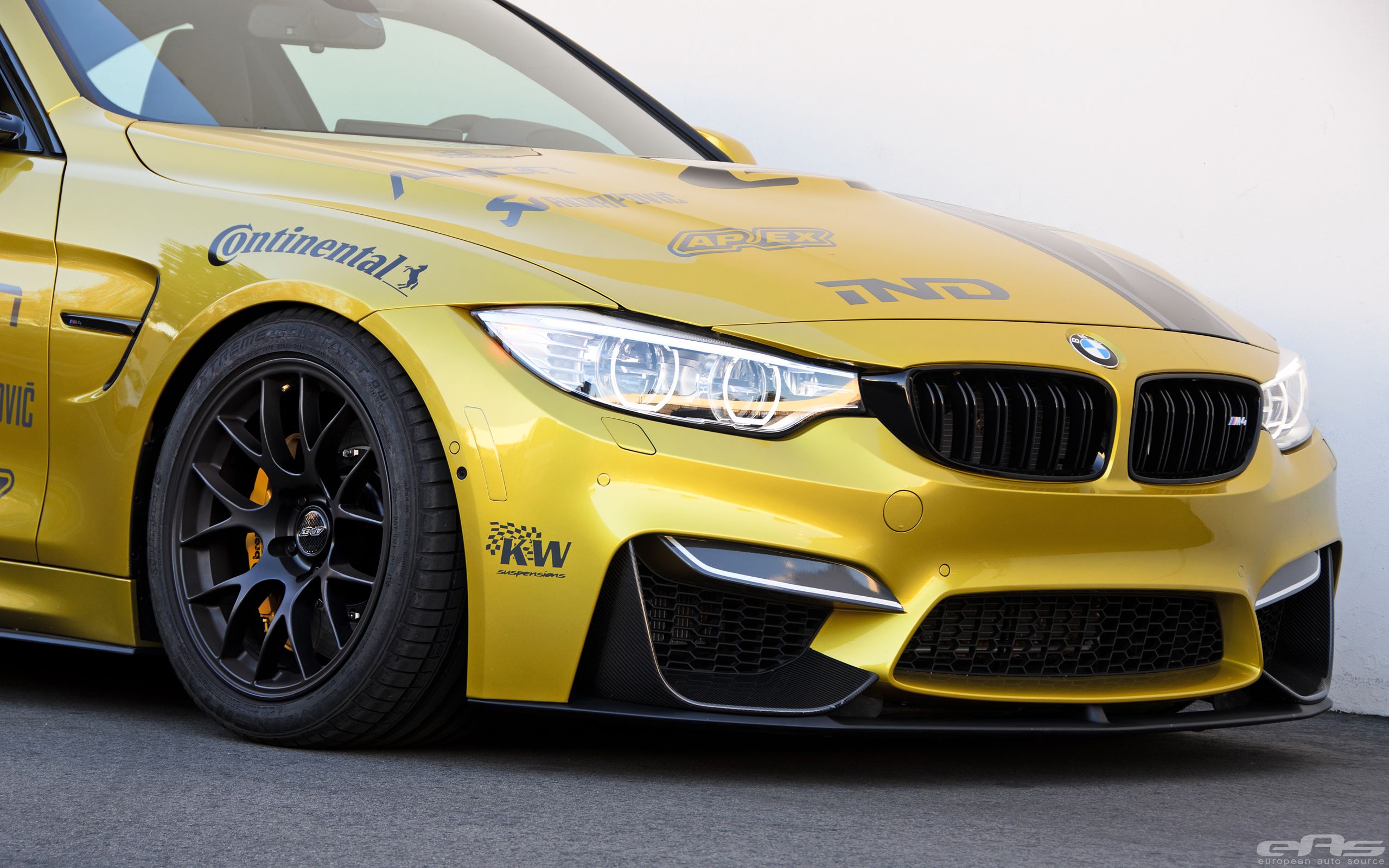Yellow BMW F82 Coupe M4 with 18" EC-7 Apex wheels in Satin Black