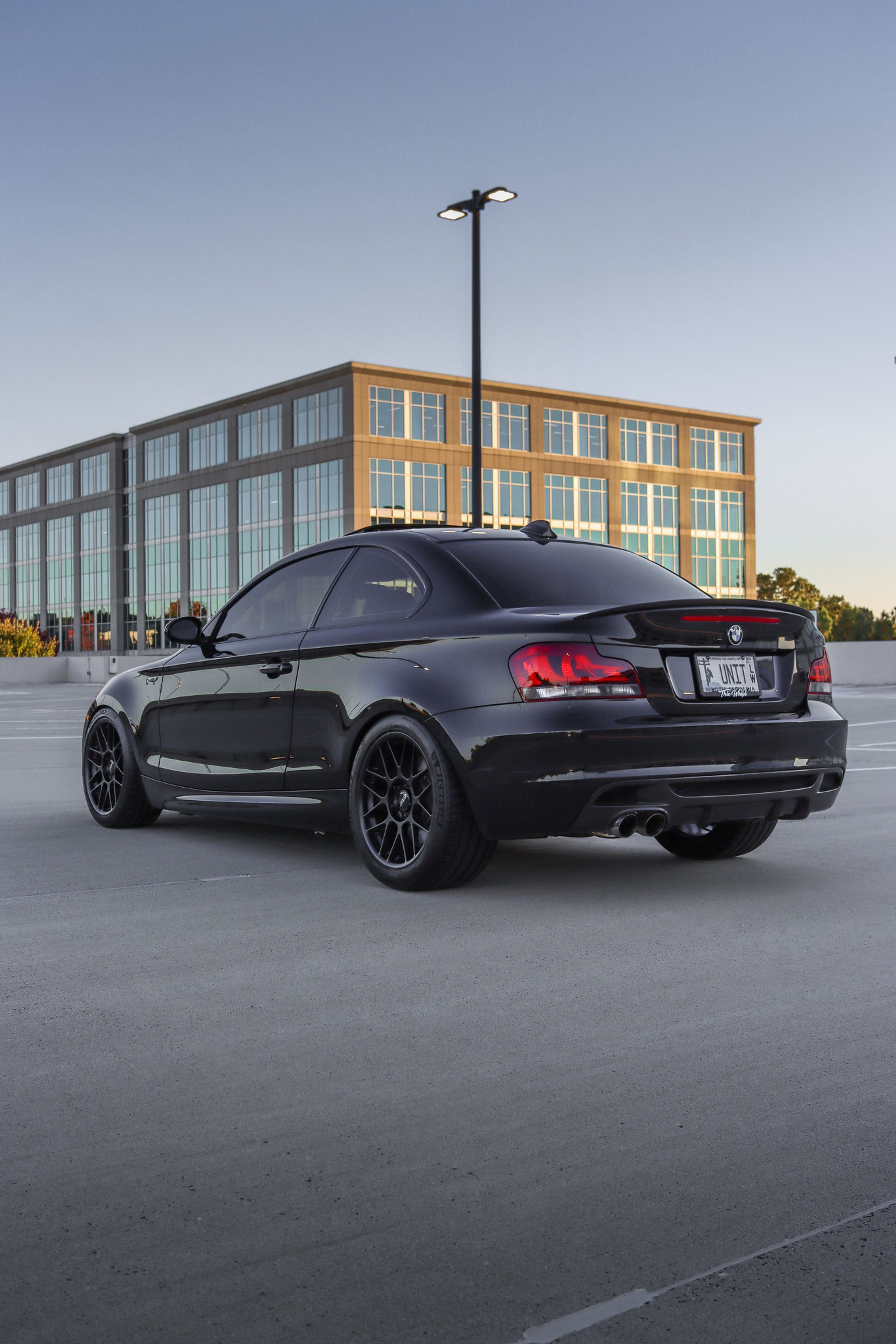 Black BMW E82 Coupe 1 Series with 18" ARC-8 Apex wheels in Satin Black