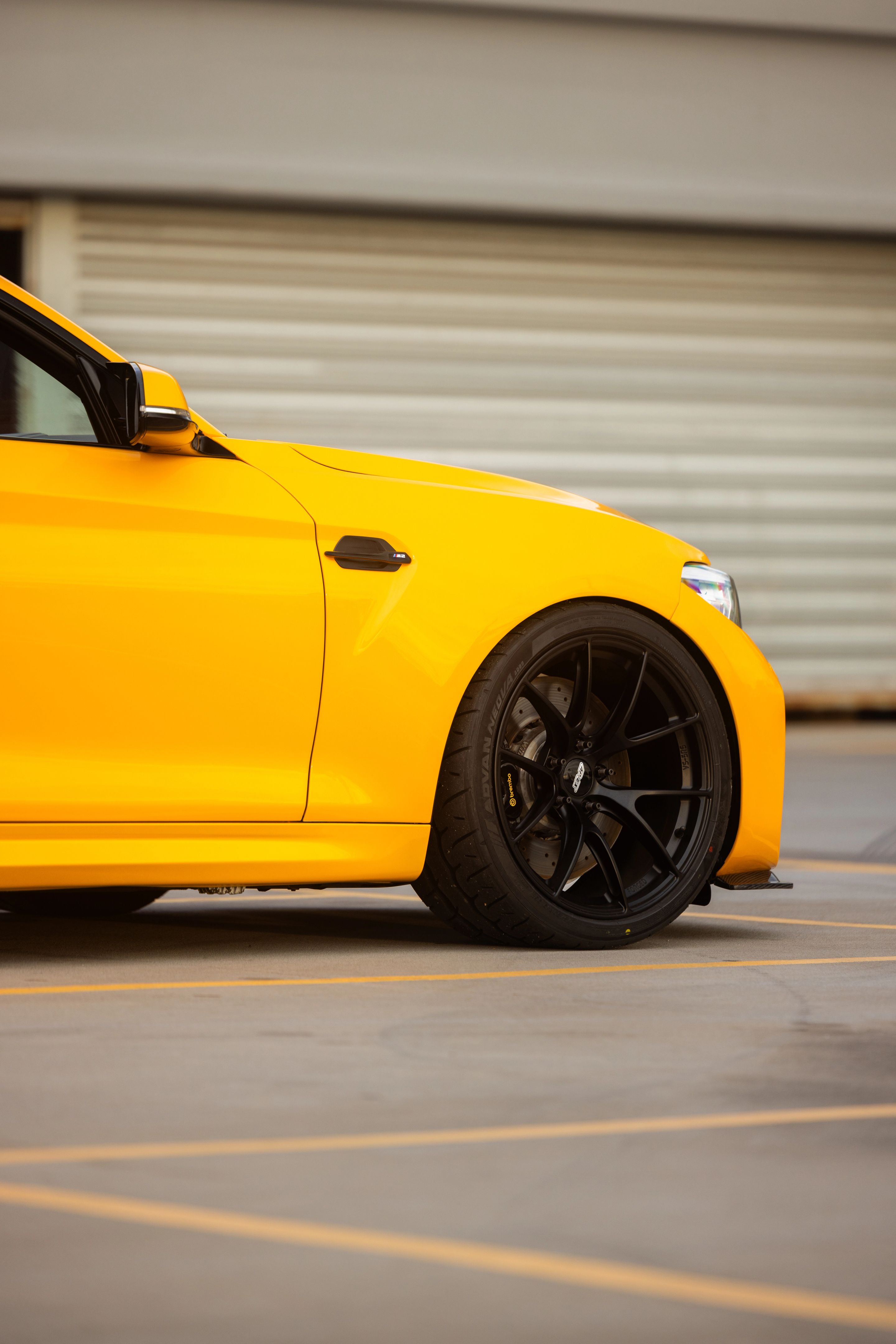 Yellow BMW F87 M2 with 19" VS-5RS Apex wheels in Satin Black