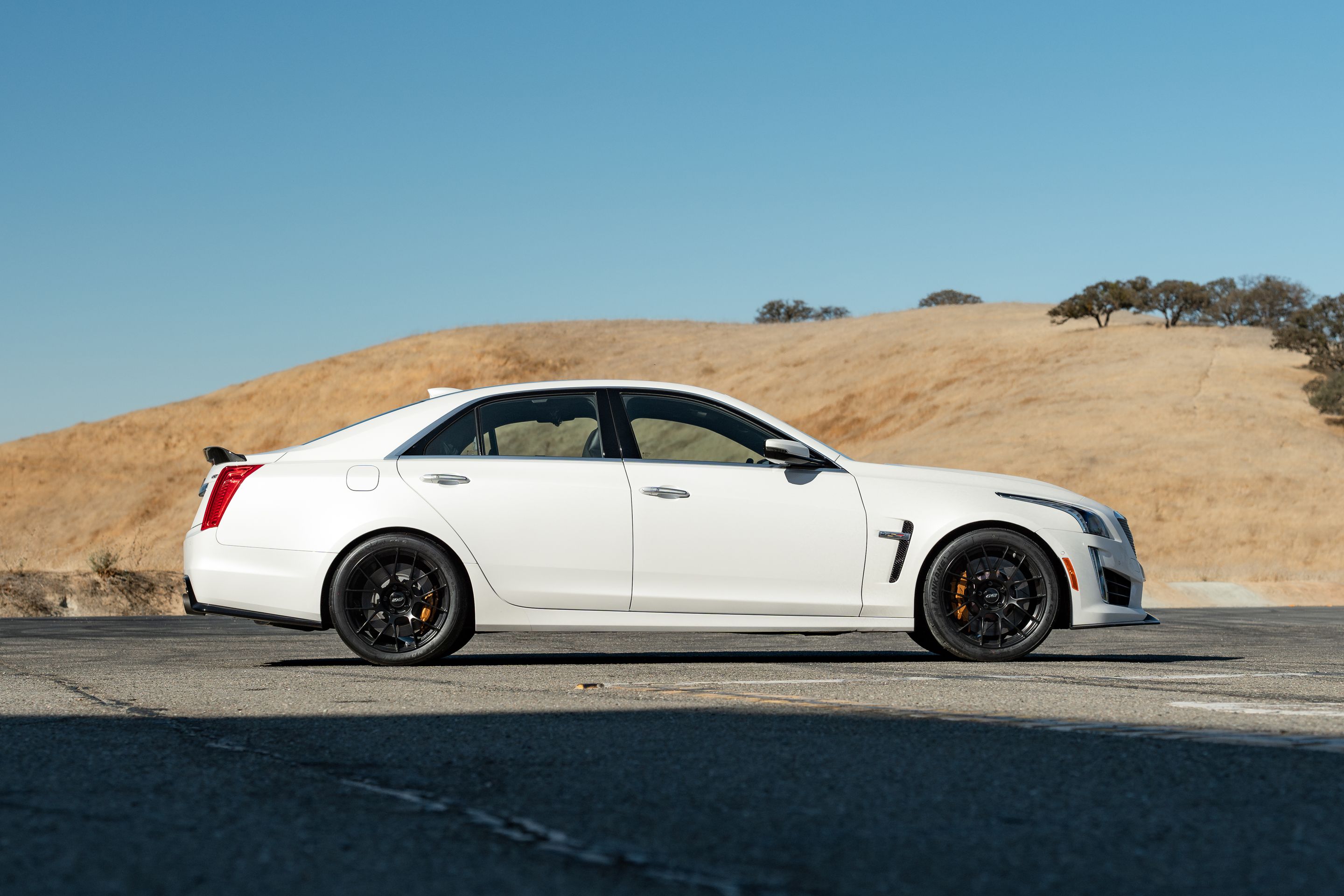 White Cadillac Gen 3 CTS-V with 19" EC-7RS Apex wheels in Satin Black