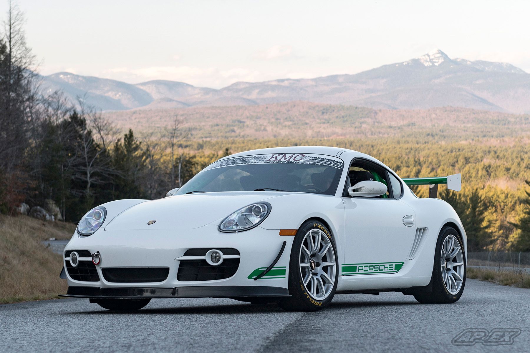 White Porsche 987 Cayman S with 18" SM-10 Apex wheels in Race Silver