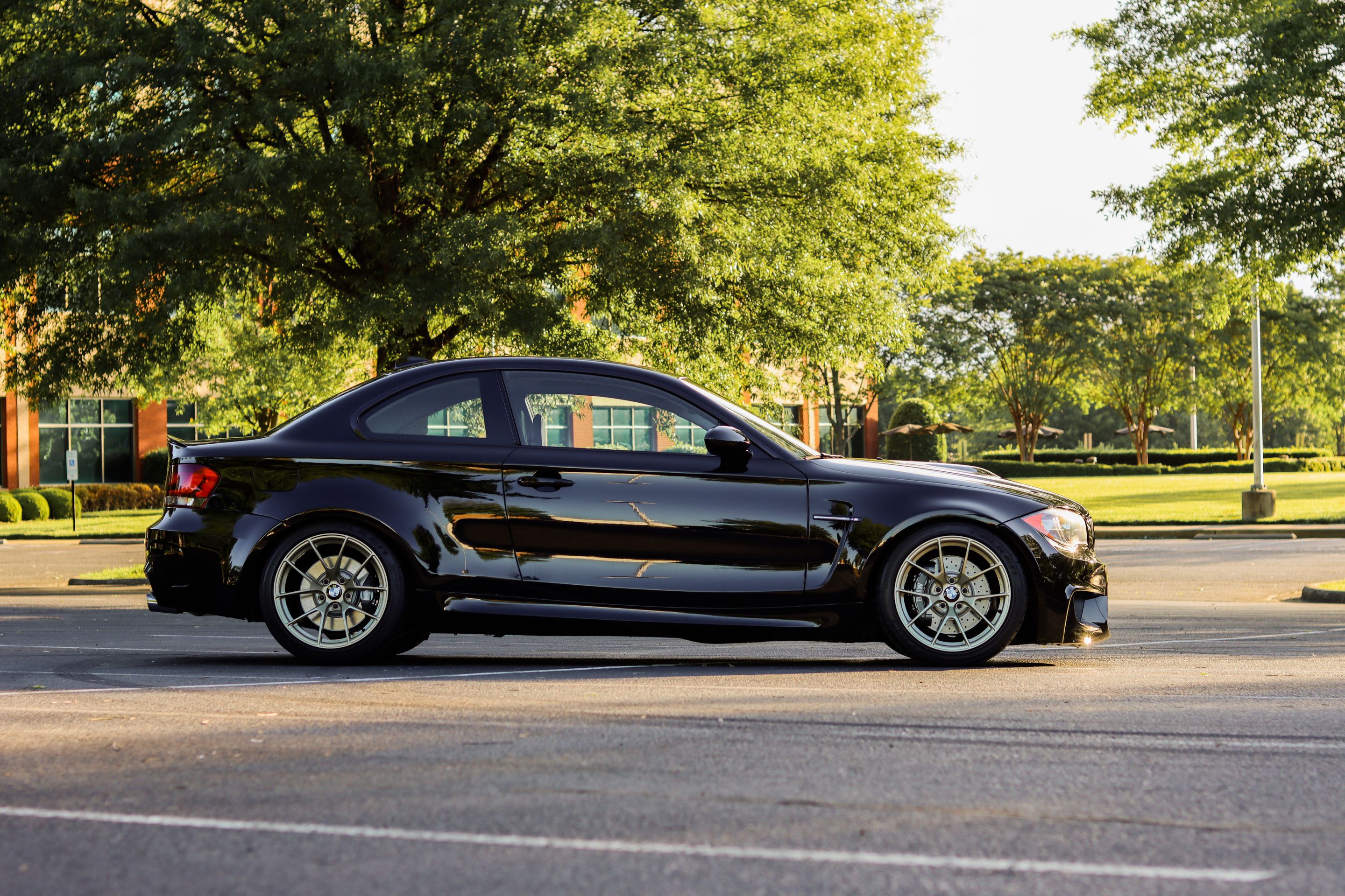 Black BMW E82 Coupe 1 Series with 18" VS-5RS Apex wheels in Motorsport Gold
