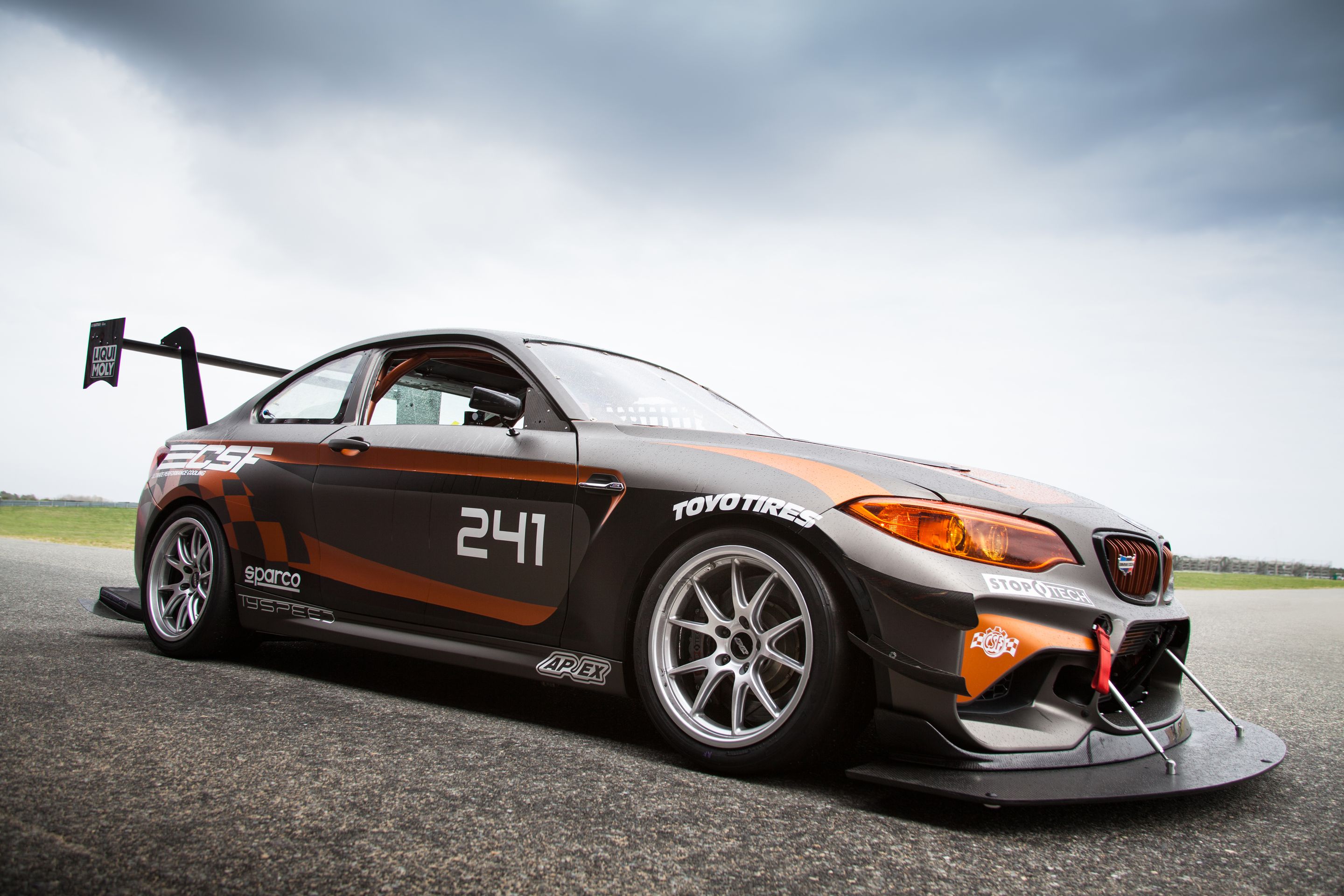 Multicolor BMW F87 M2 with 18" FL-5 Apex wheels in Race Silver