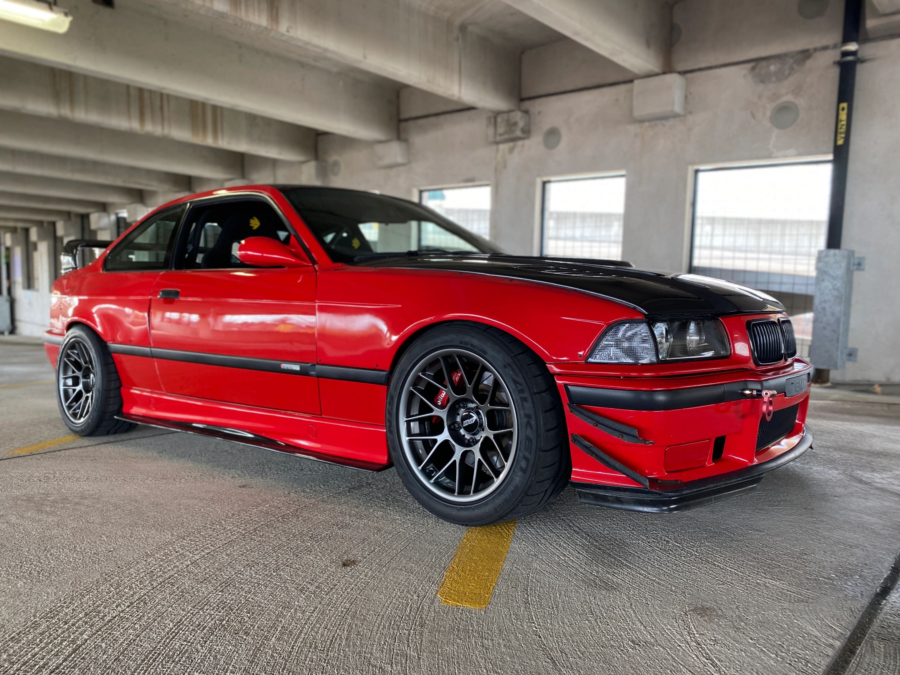 Red BMW E36 M3 with 17" ARC-8 Apex wheels in Anthracite