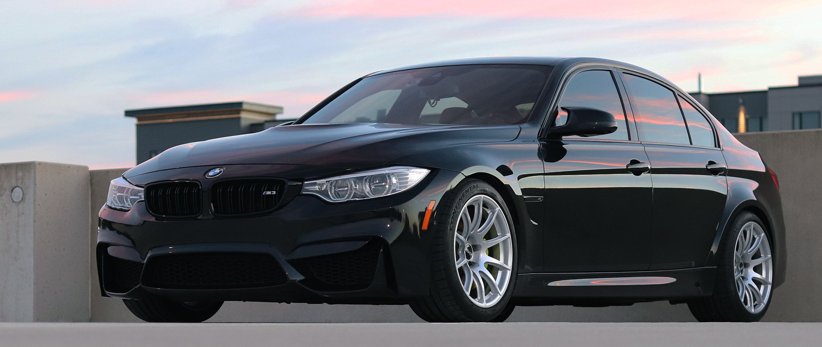 Black BMW F80 M3 with 18" SM-10 Apex wheels in Race Silver
