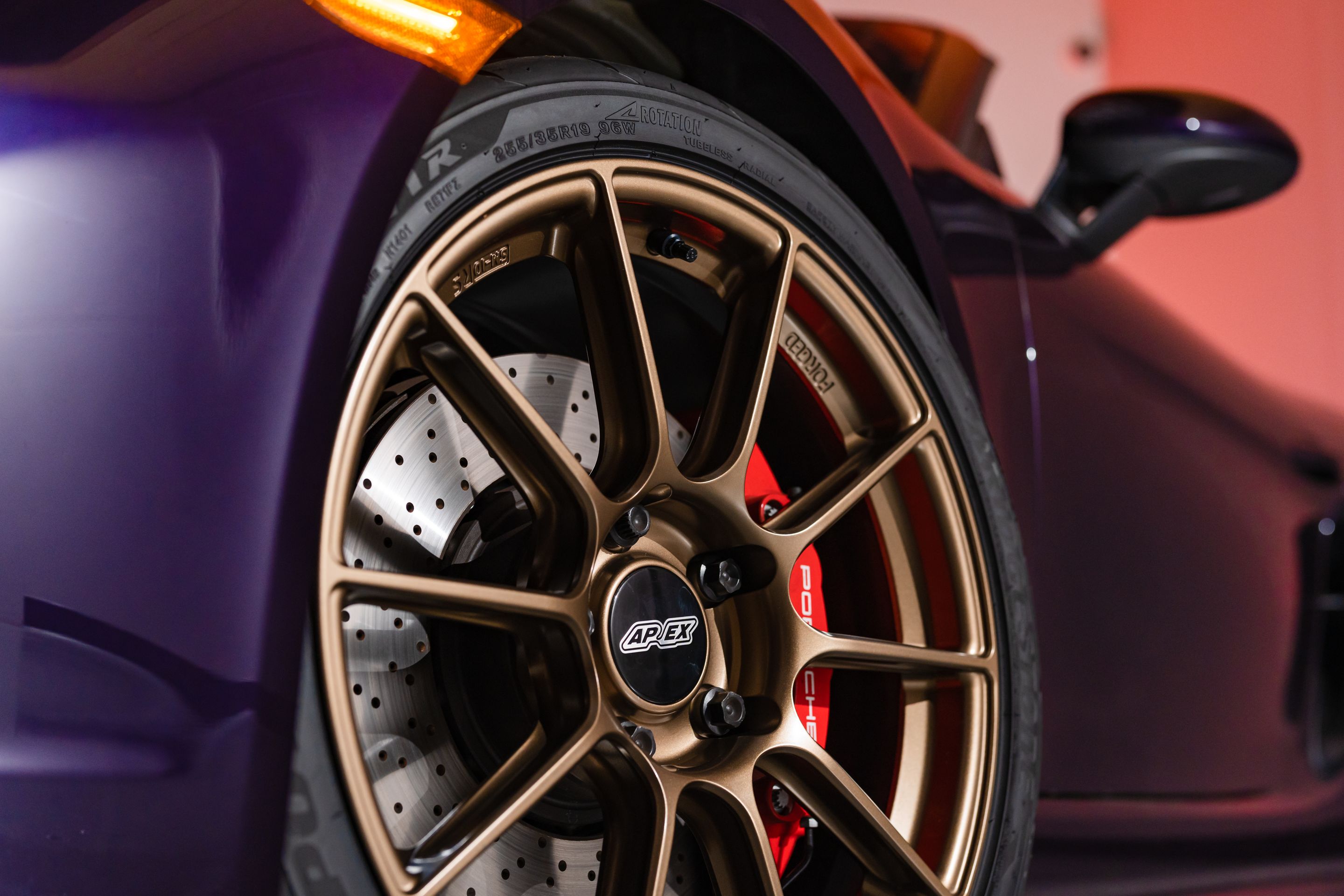 Purple Porsche 718 Boxster GTS 4.0L with 19" SM-10RS Apex wheels in Satin Bronze