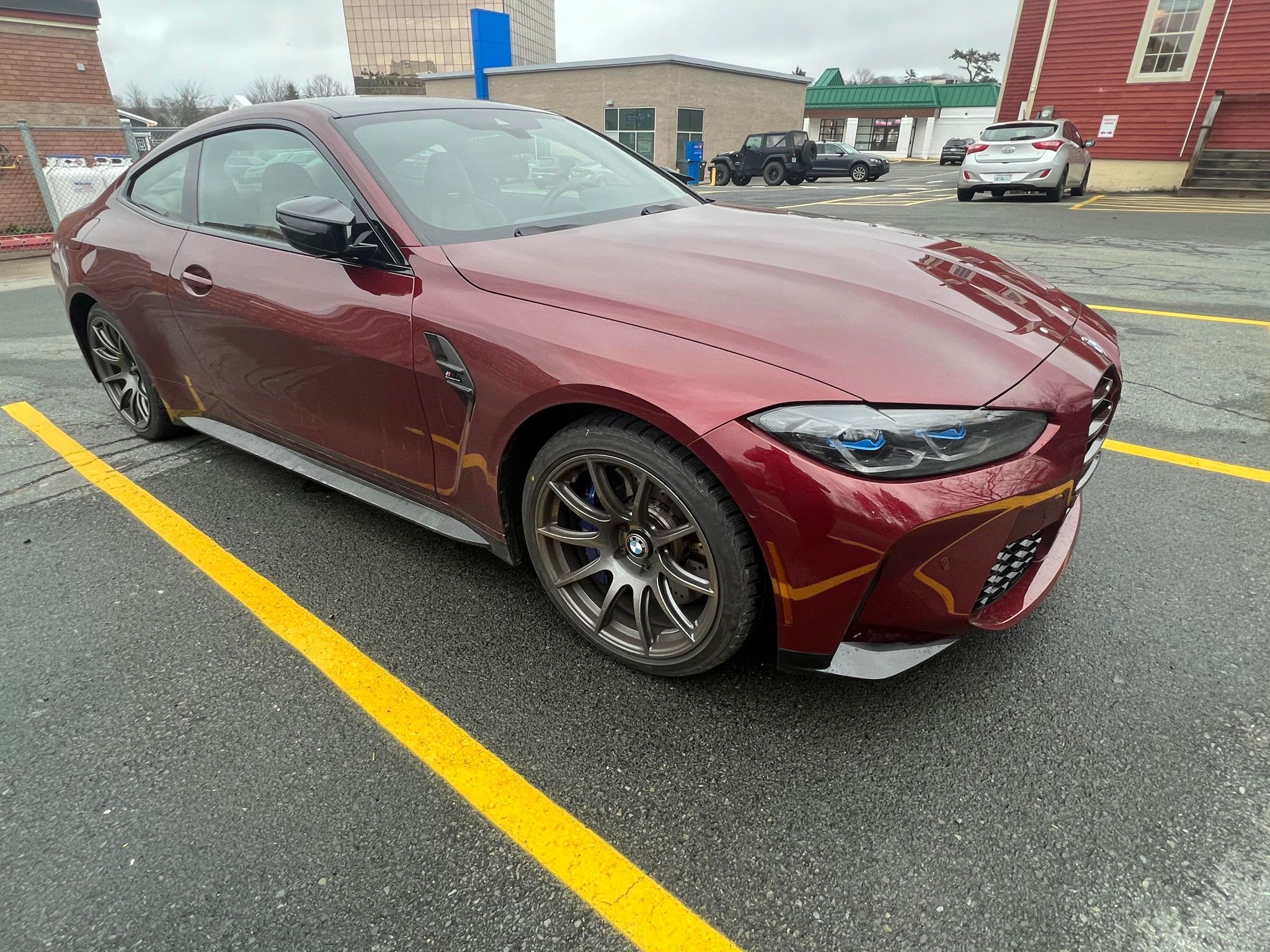 Red BMW G82 Coupe M4 with 19" SM-10 Apex wheels in Anthracite