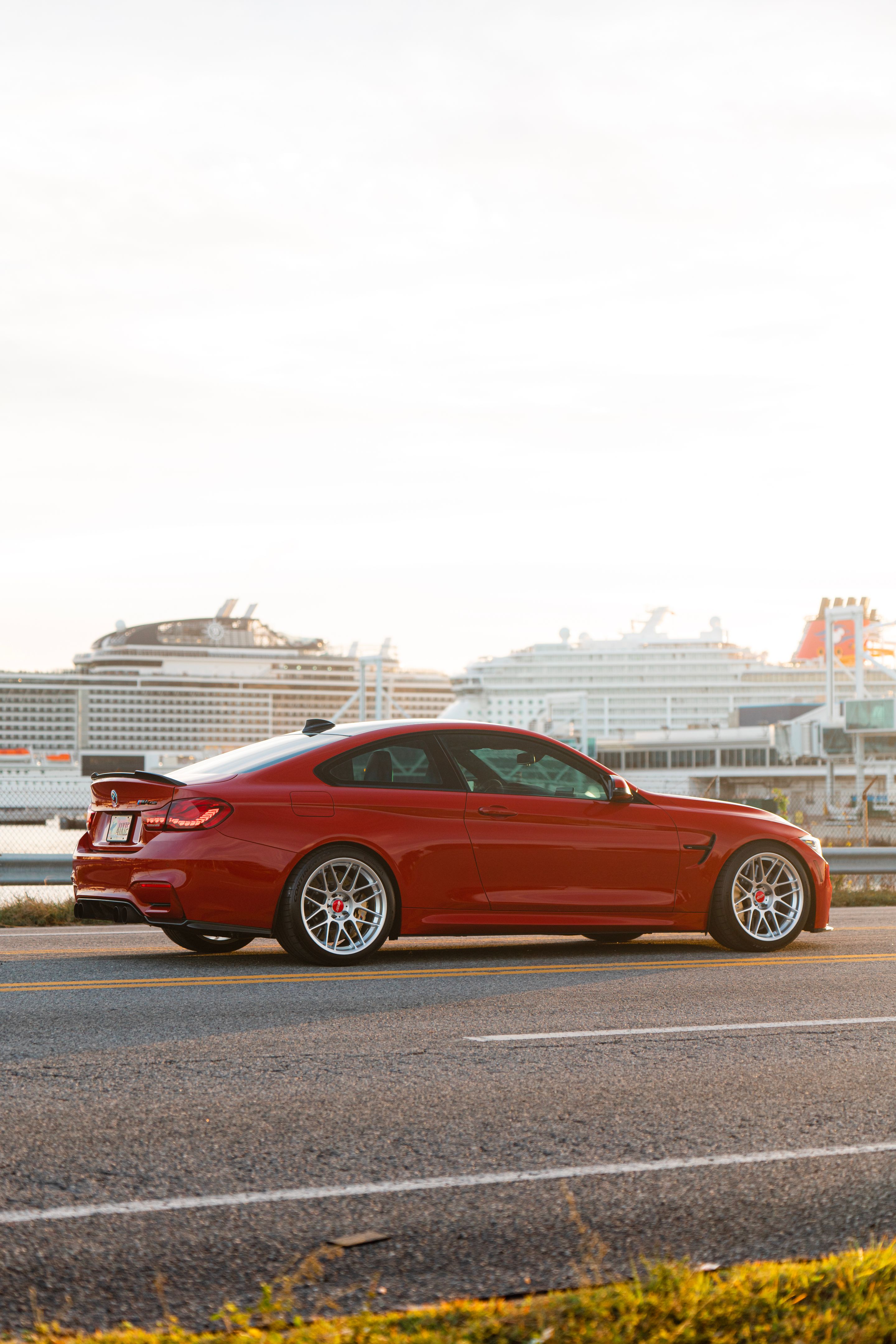 Red BMW F82 Coupe M4 with 19" ARC-8 Apex wheels in Hyper Silver