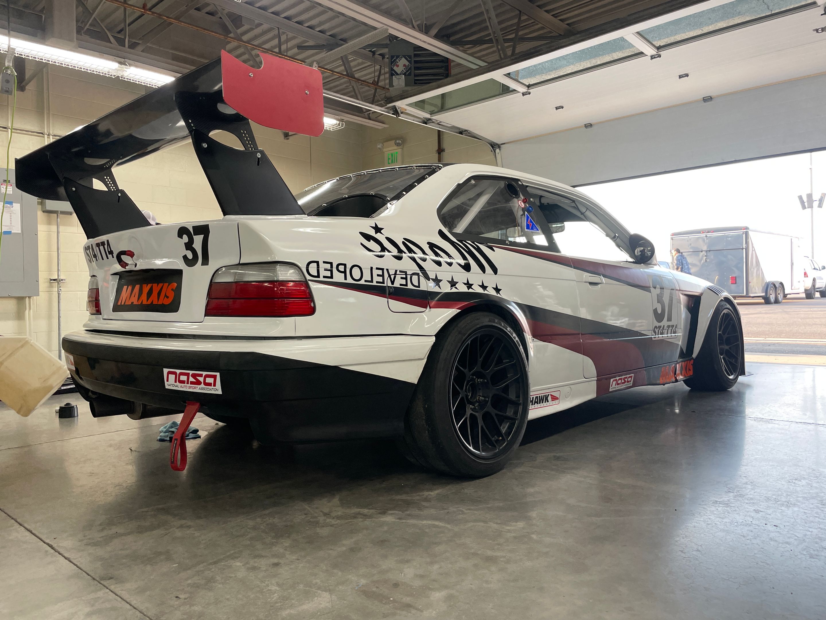 Multicolor BMW E36 3 Series with 17" ARC-8 Apex wheels in Satin Black