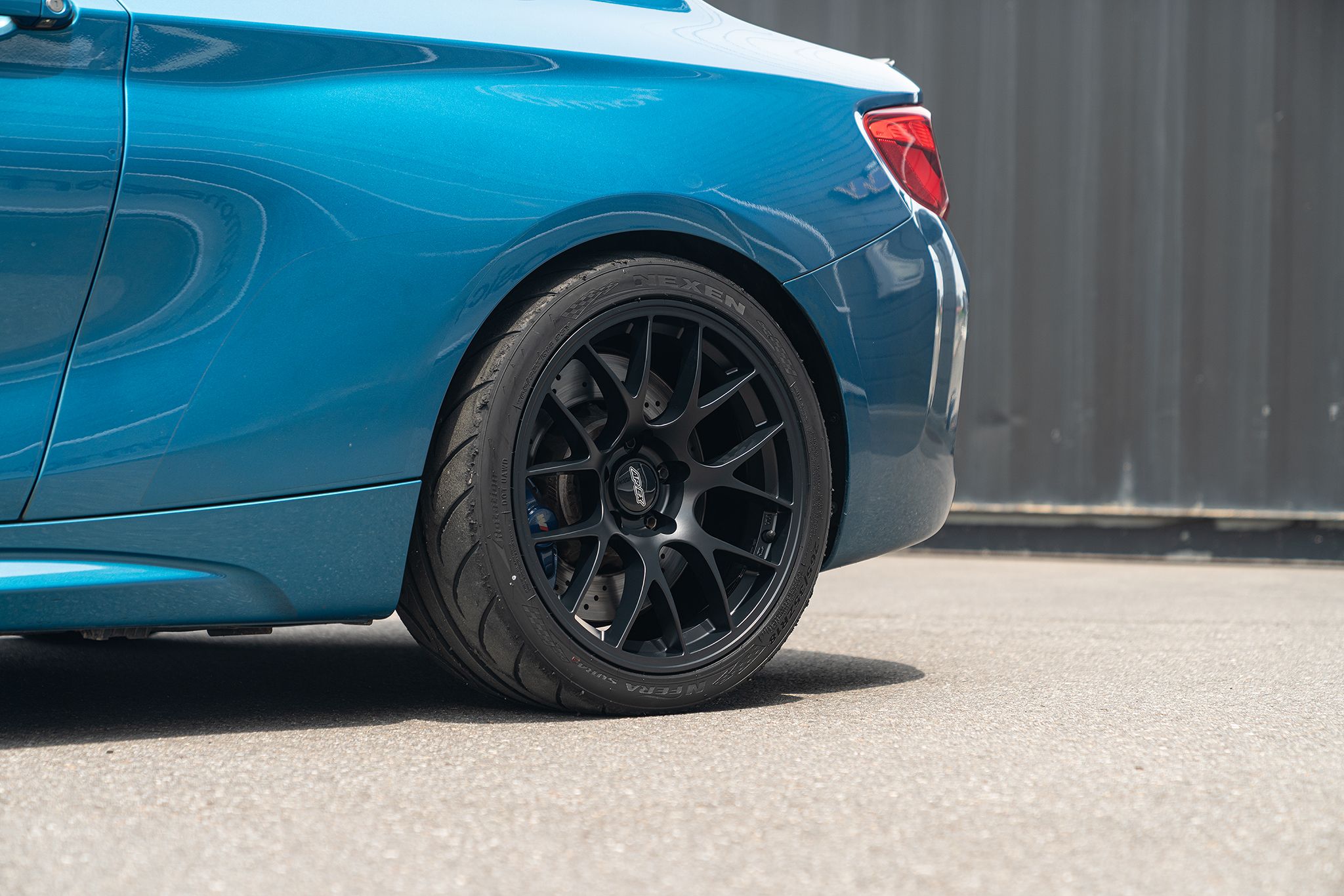 Blue BMW F87 M2 with 18" EC-7 Apex wheels in Satin Black